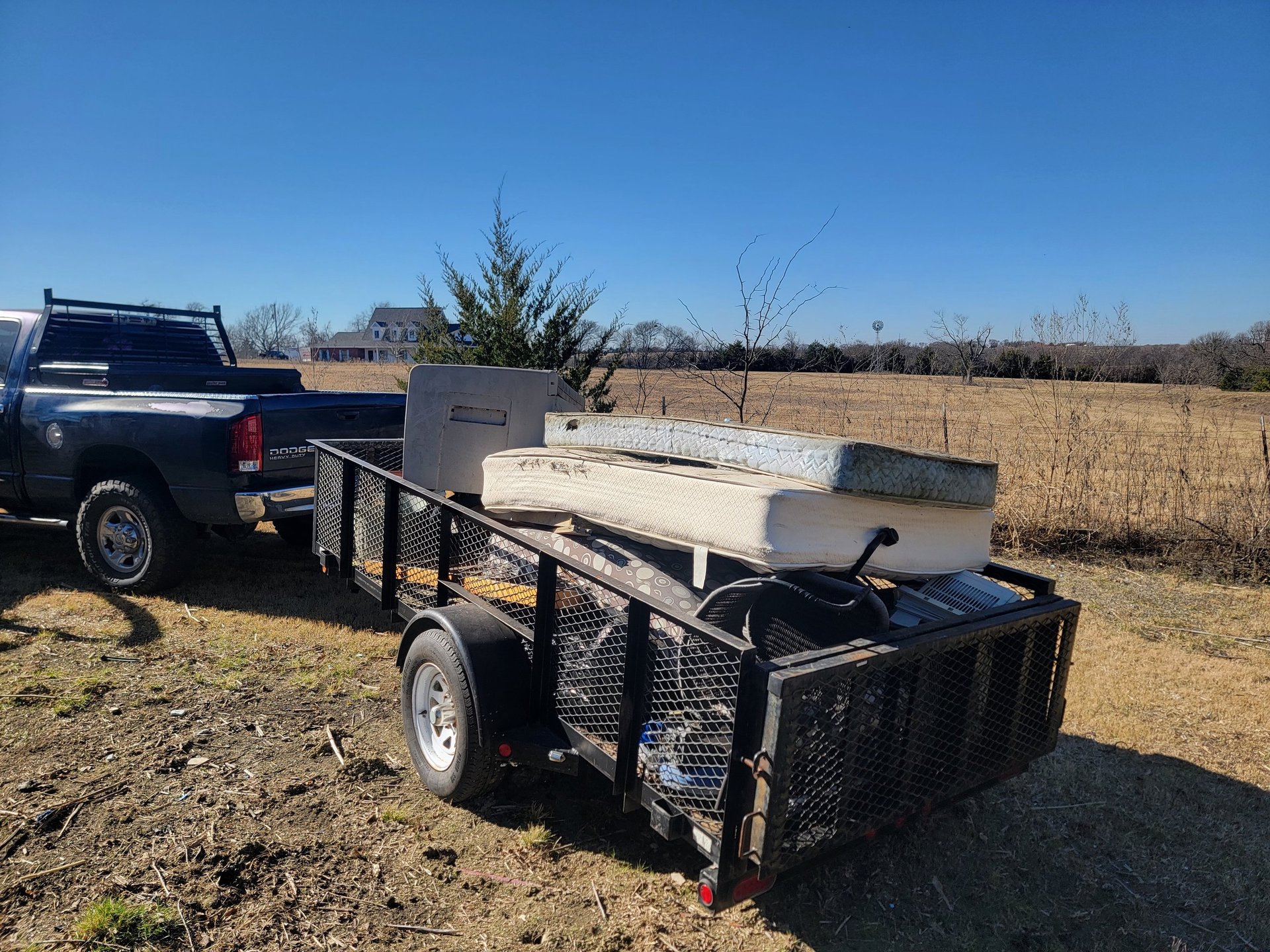black and brown leather padded tub sofa