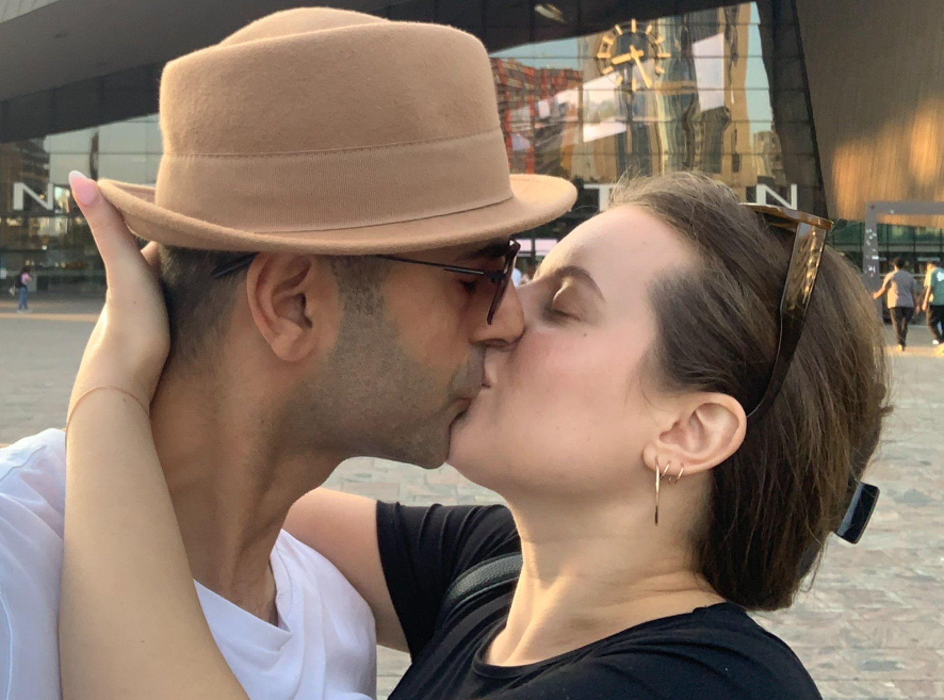 couple wearing silver-colored rings