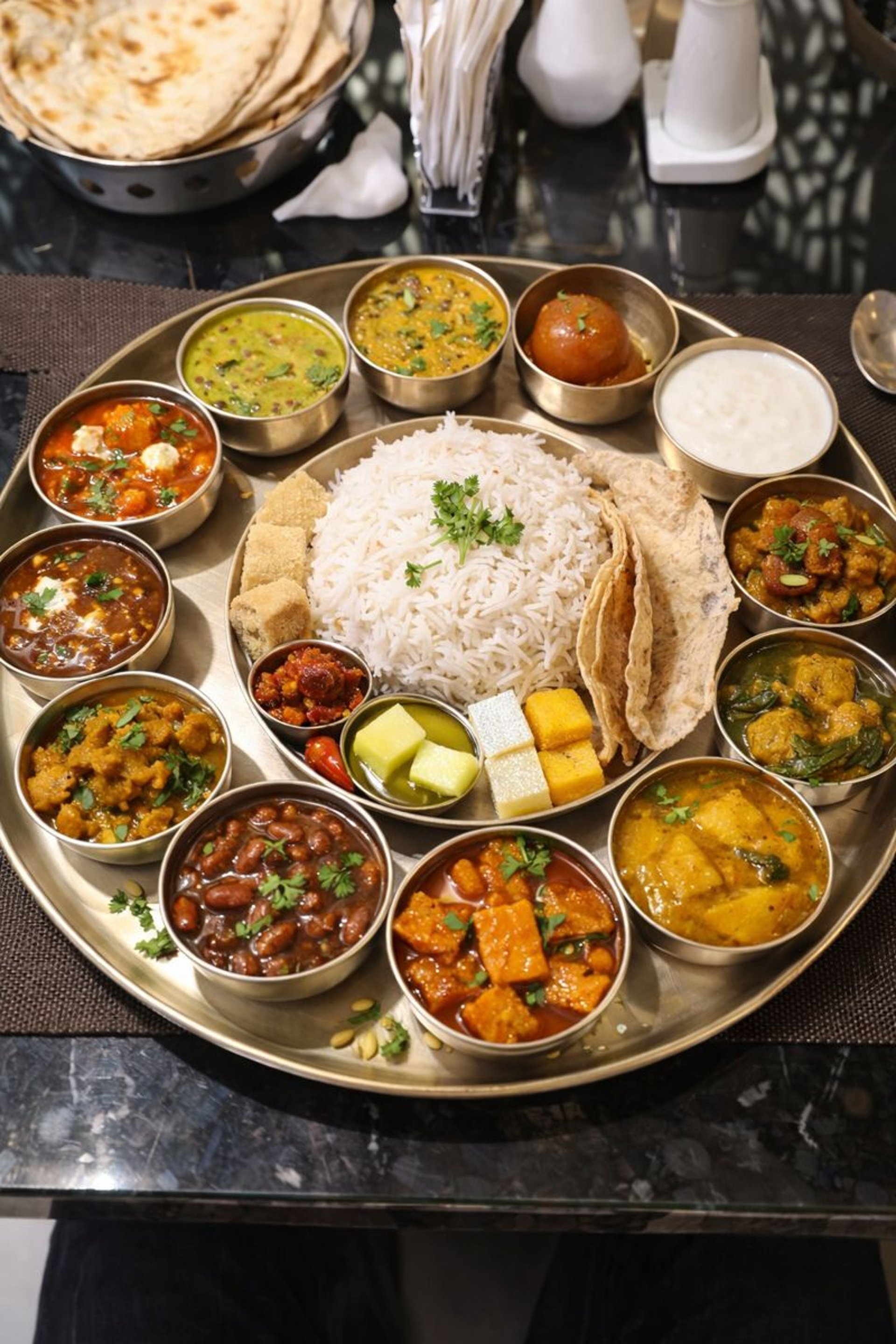 woman wearing yellow long-sleeved dress under white clouds and blue sky during daytime