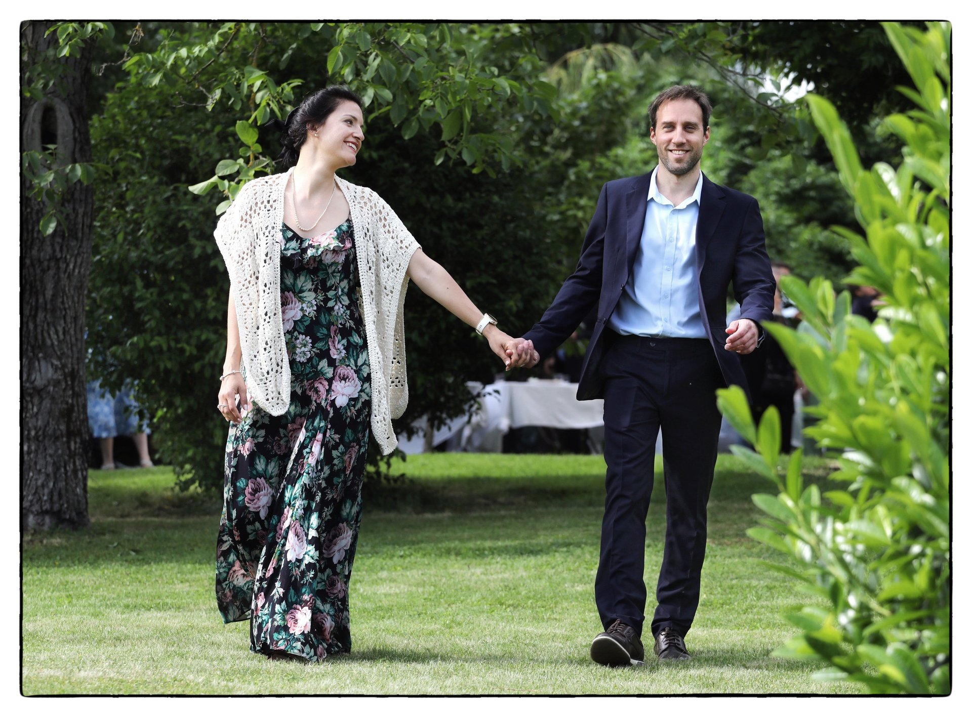 couple wearing silver-colored rings