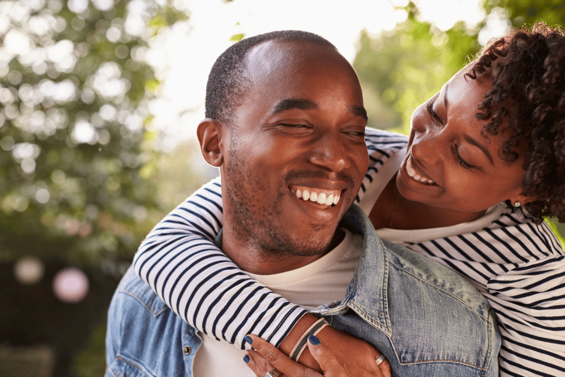 a man and a woman standing next to each other