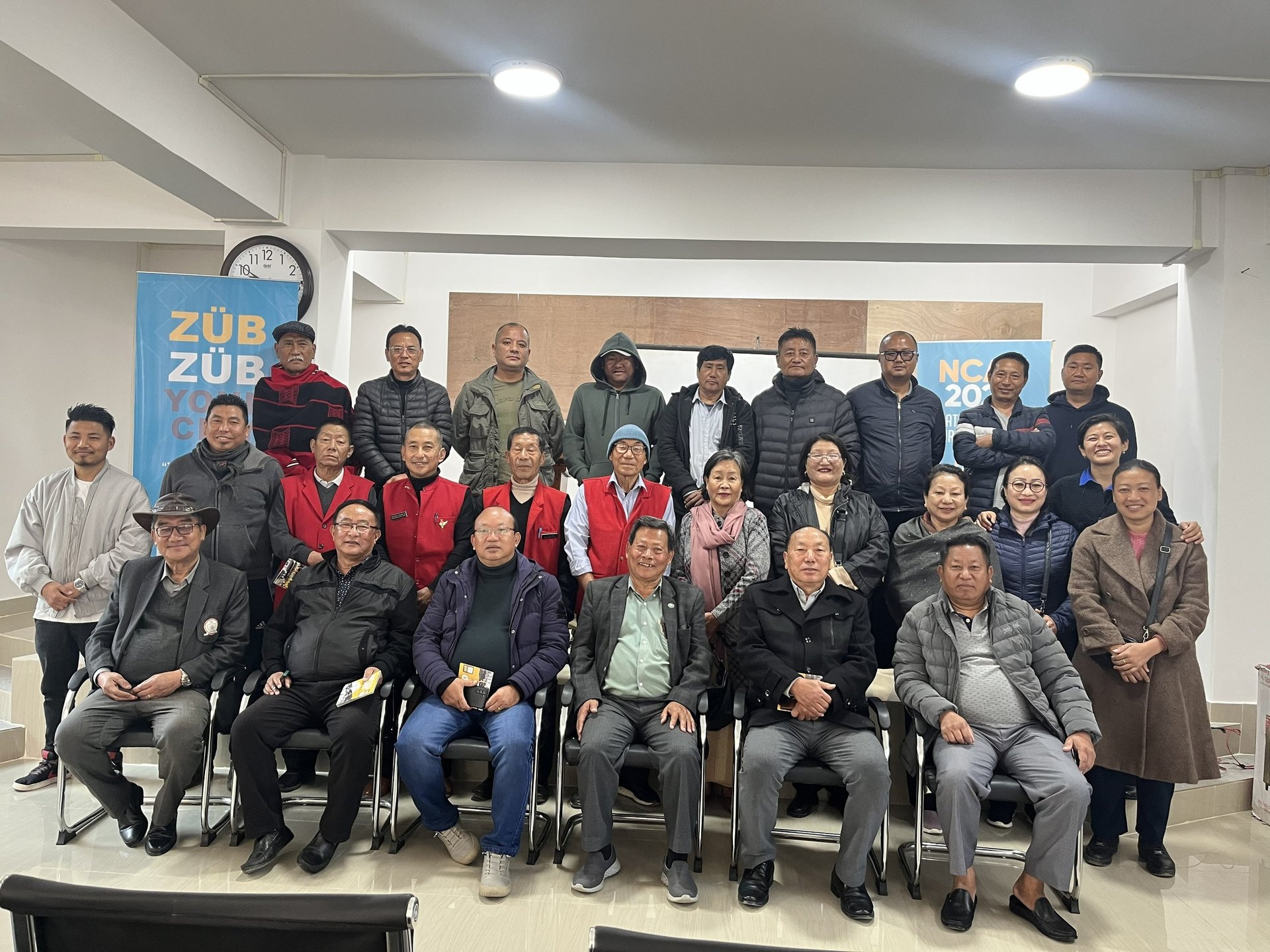 an abstract photo of a curved building with a blue sky in the background