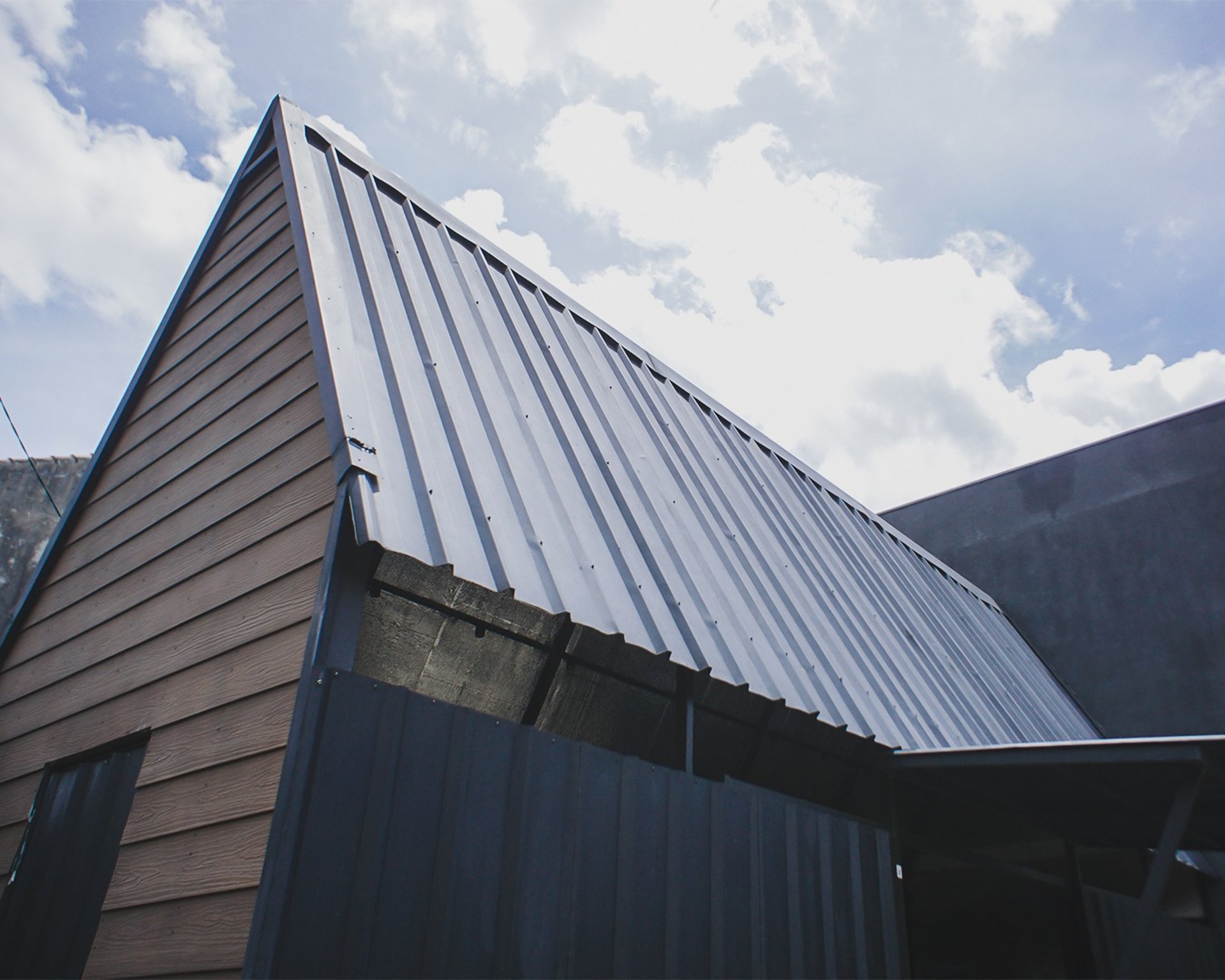 person wearing grey knit sweater