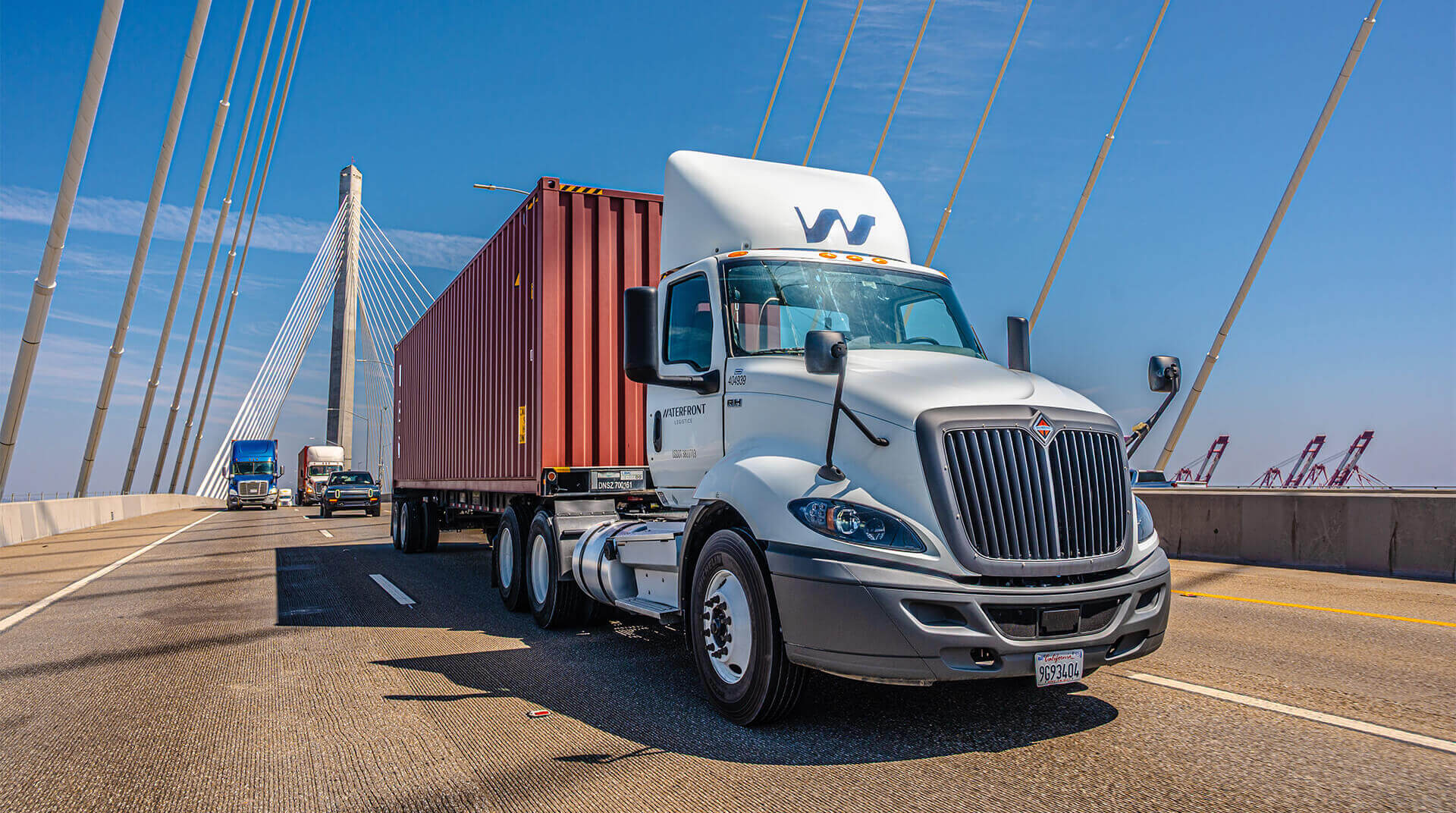 an abstract photo of a curved building with a blue sky in the background
