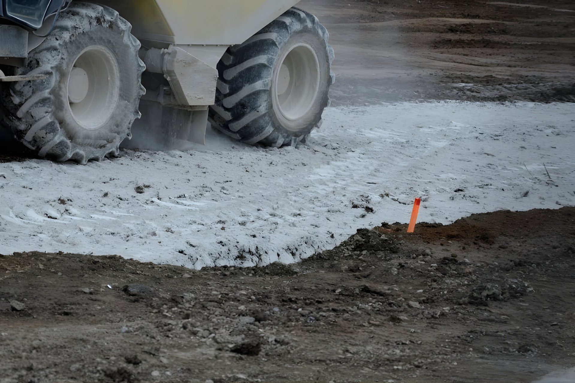 aerial photography of three heavy equipment