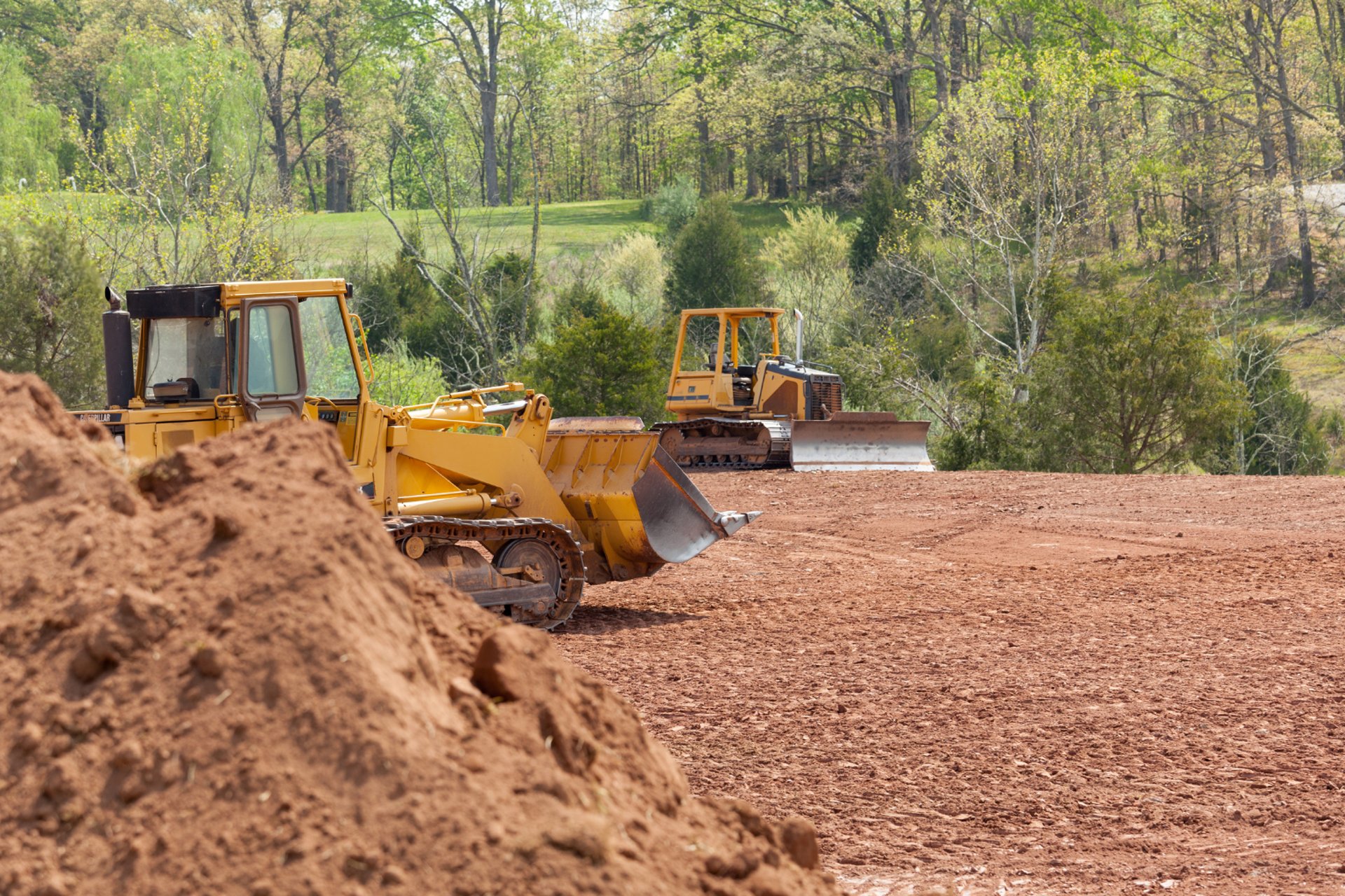 an abstract photo of a curved building with a blue sky in the background