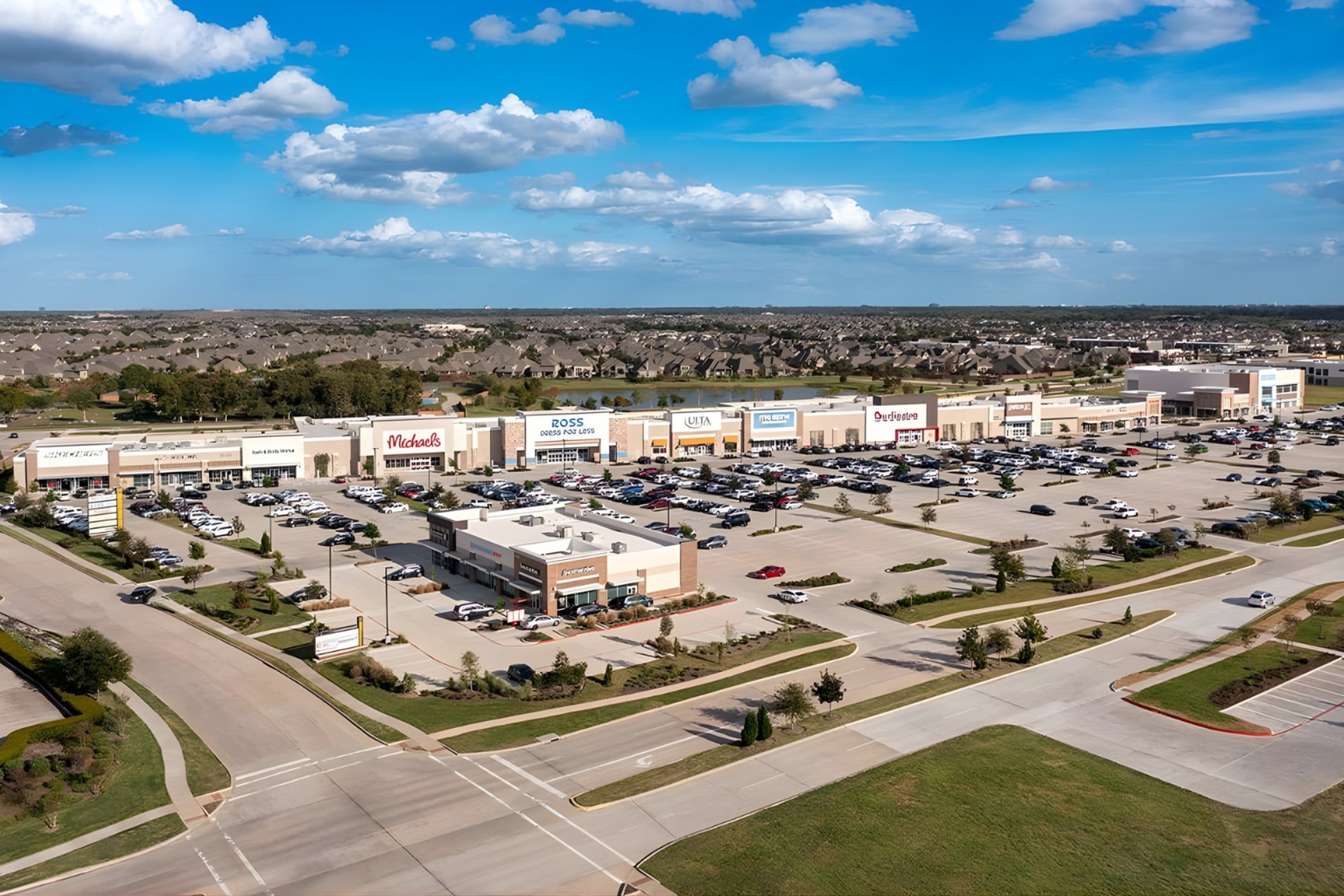 aerial photography of three heavy equipment