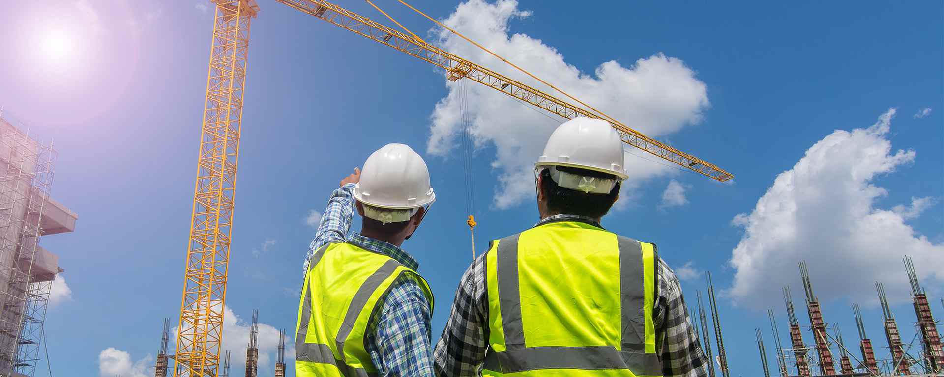 an abstract photo of a curved building with a blue sky in the background