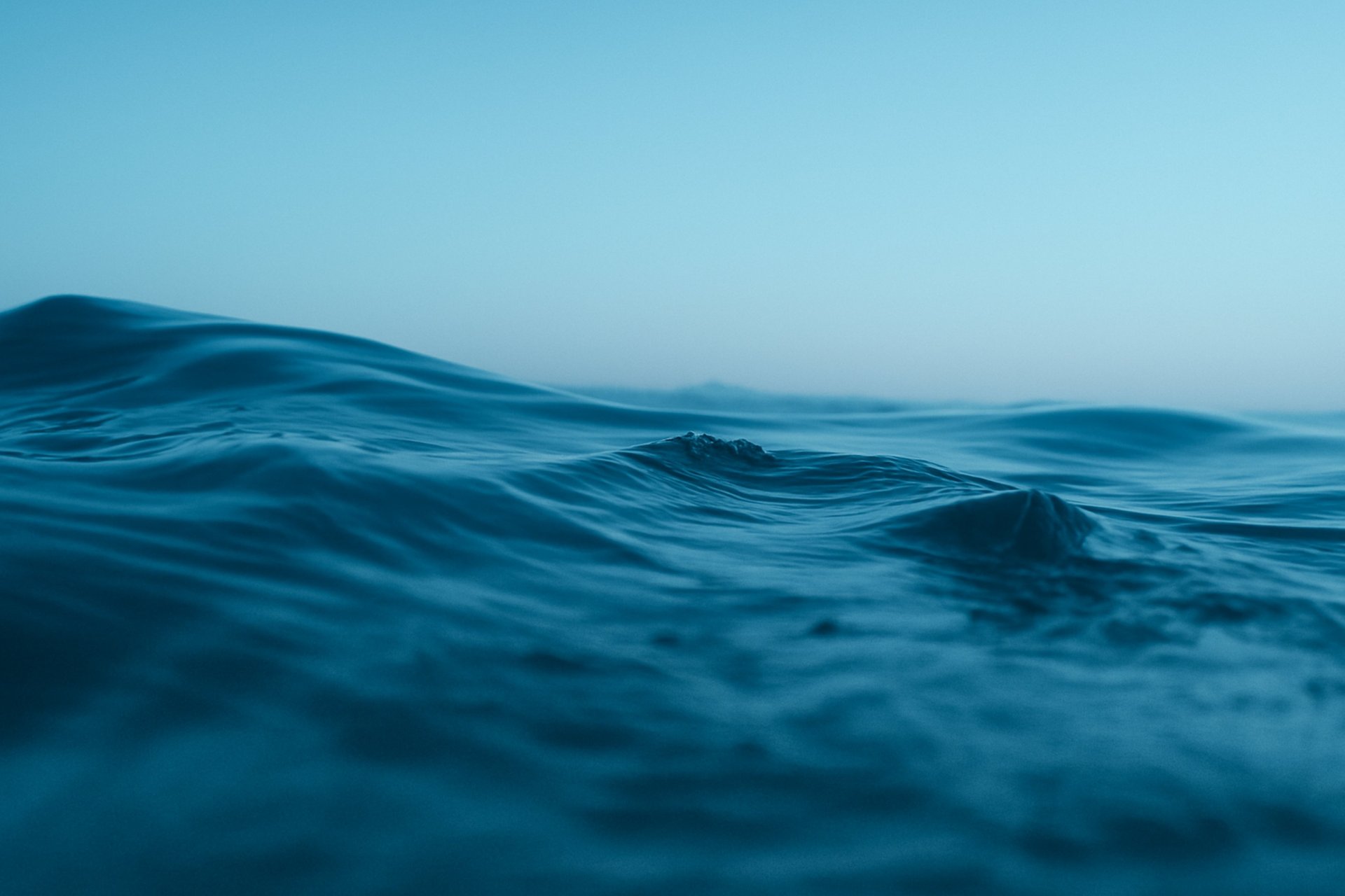 body of water under sky