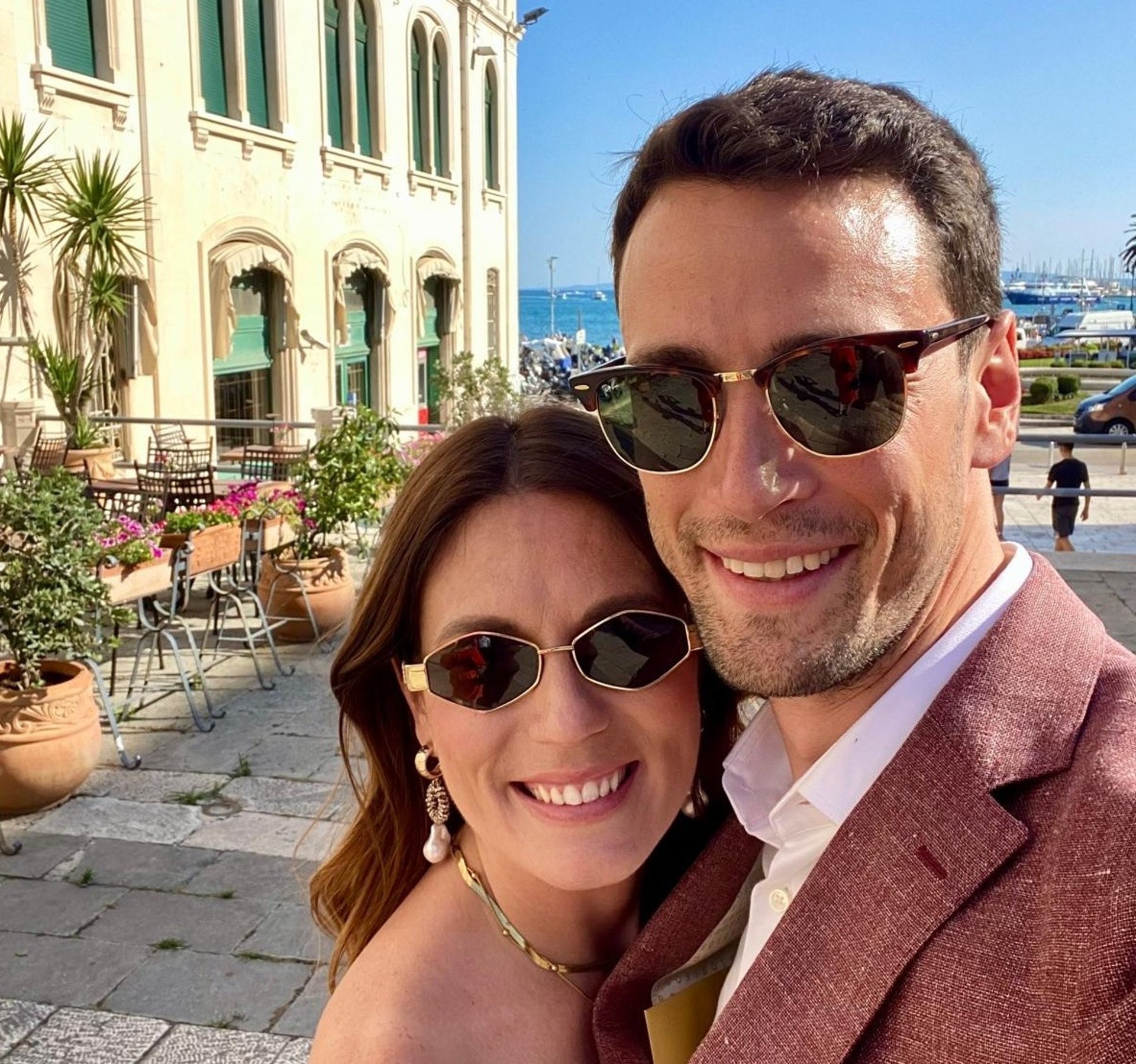 couple wearing silver-colored rings