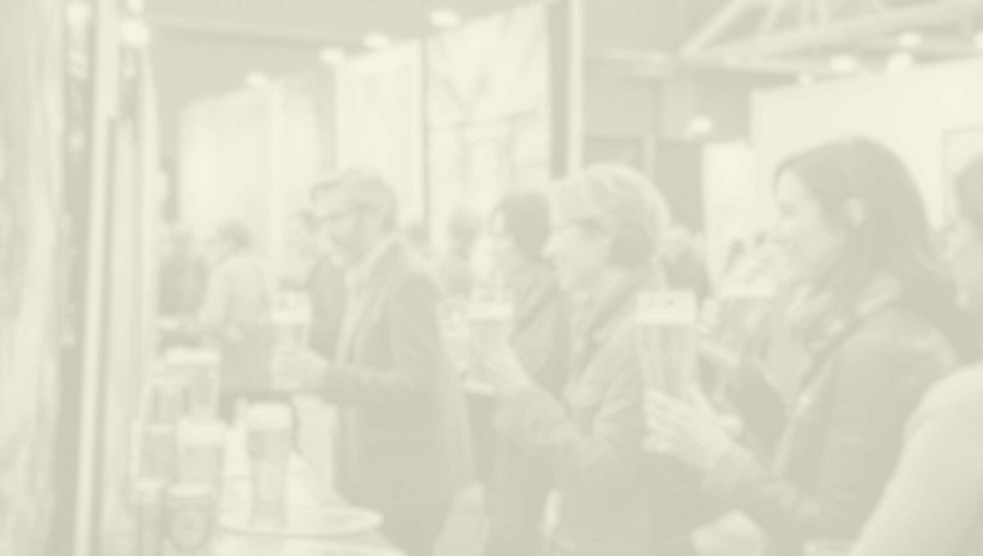 an abstract photo of a curved building with a blue sky in the background