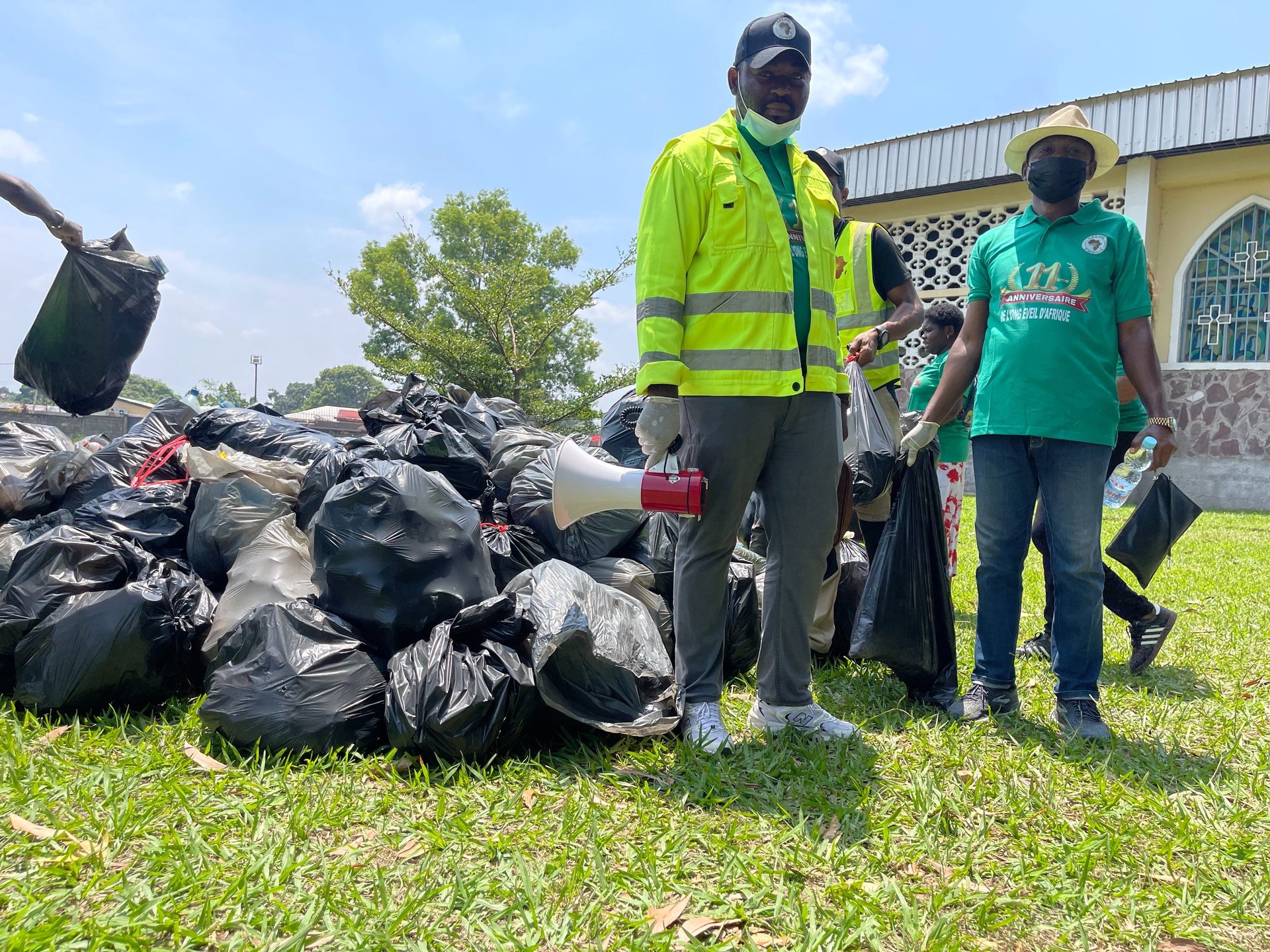 an abstract photo of a curved building with a blue sky in the background