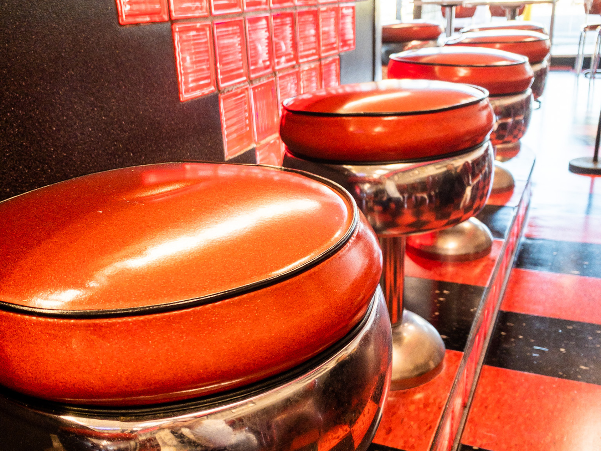 woman wearing yellow long-sleeved dress under white clouds and blue sky during daytime