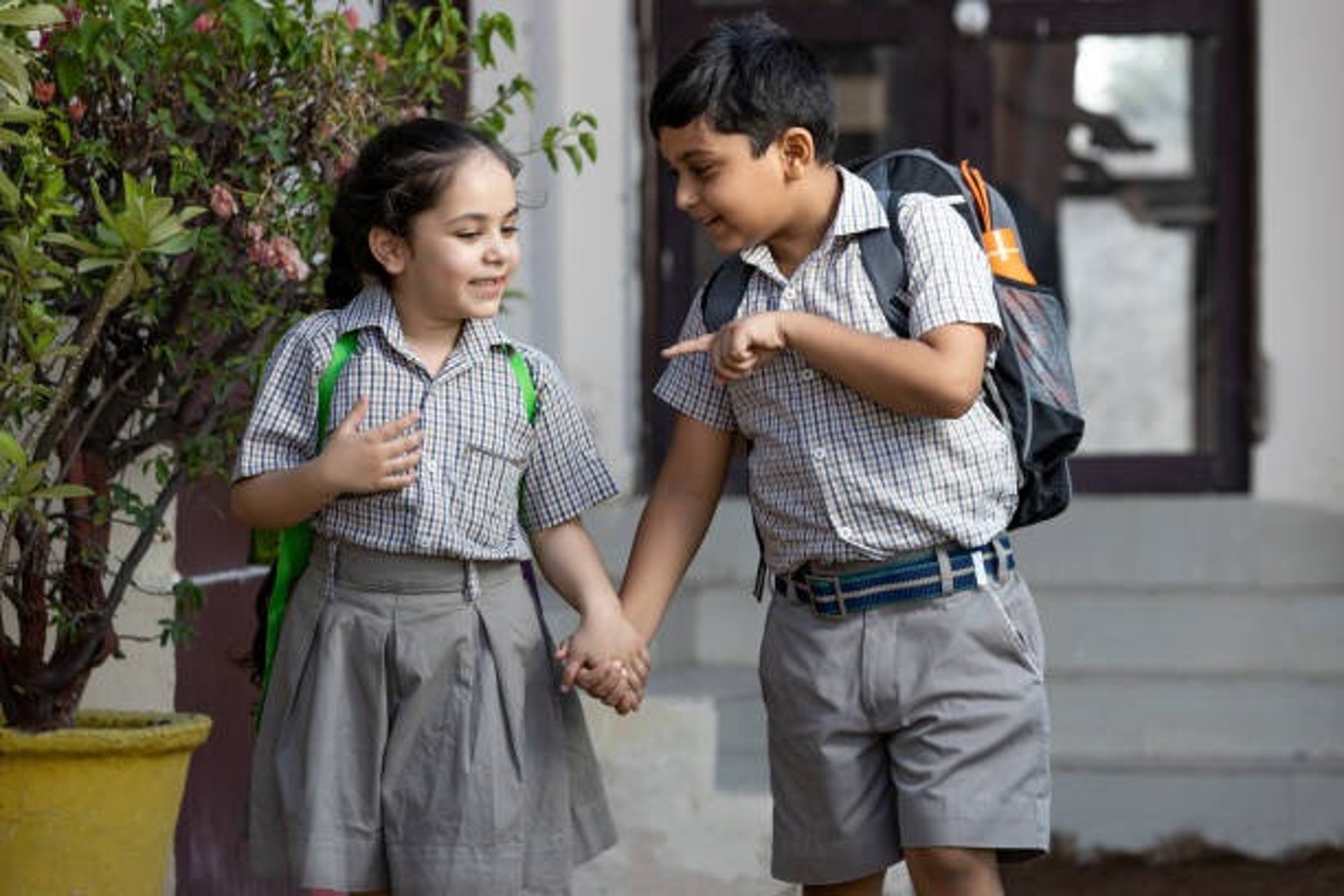 woman wearing yellow long-sleeved dress under white clouds and blue sky during daytime