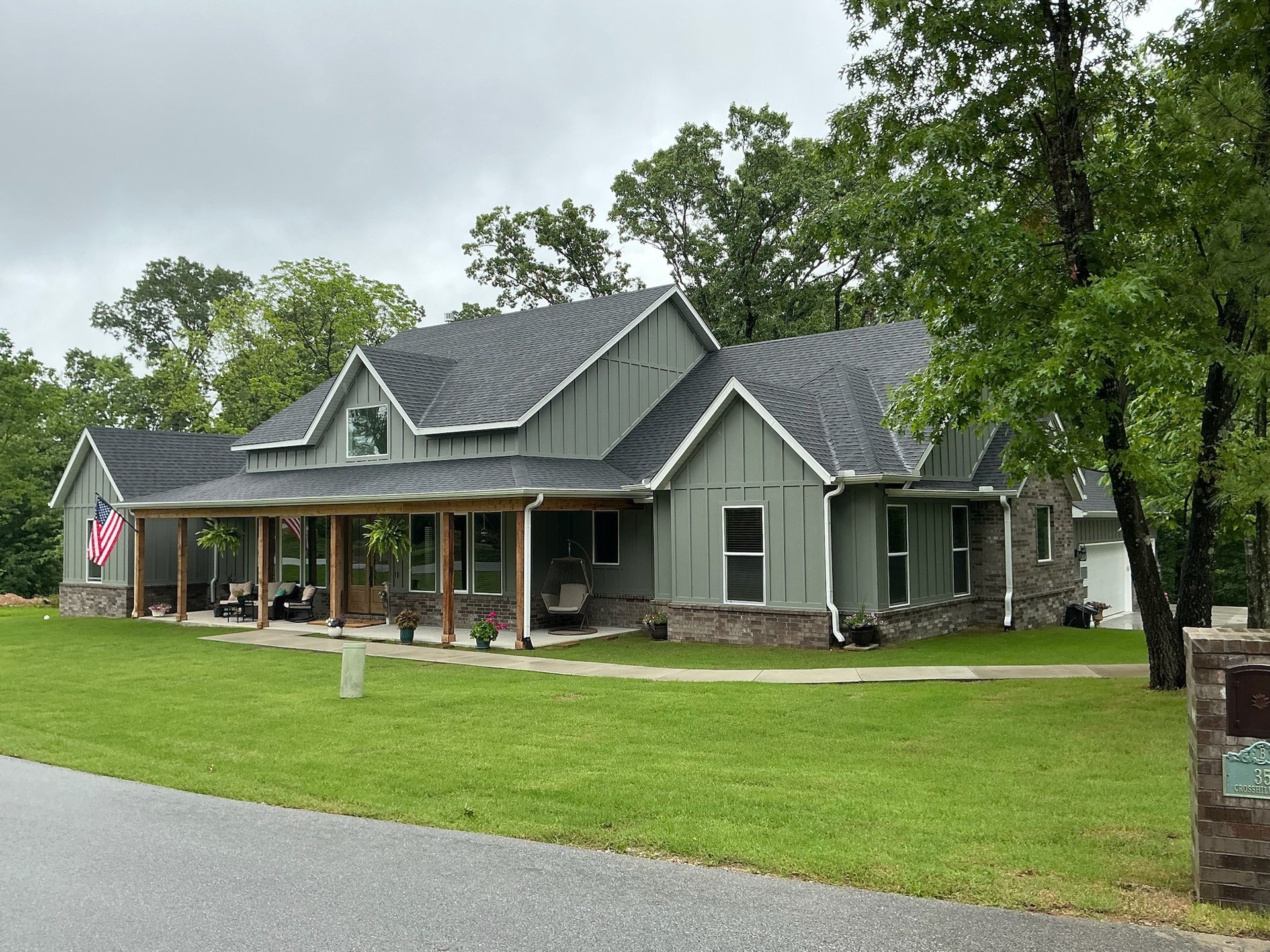 black and brown leather padded tub sofa