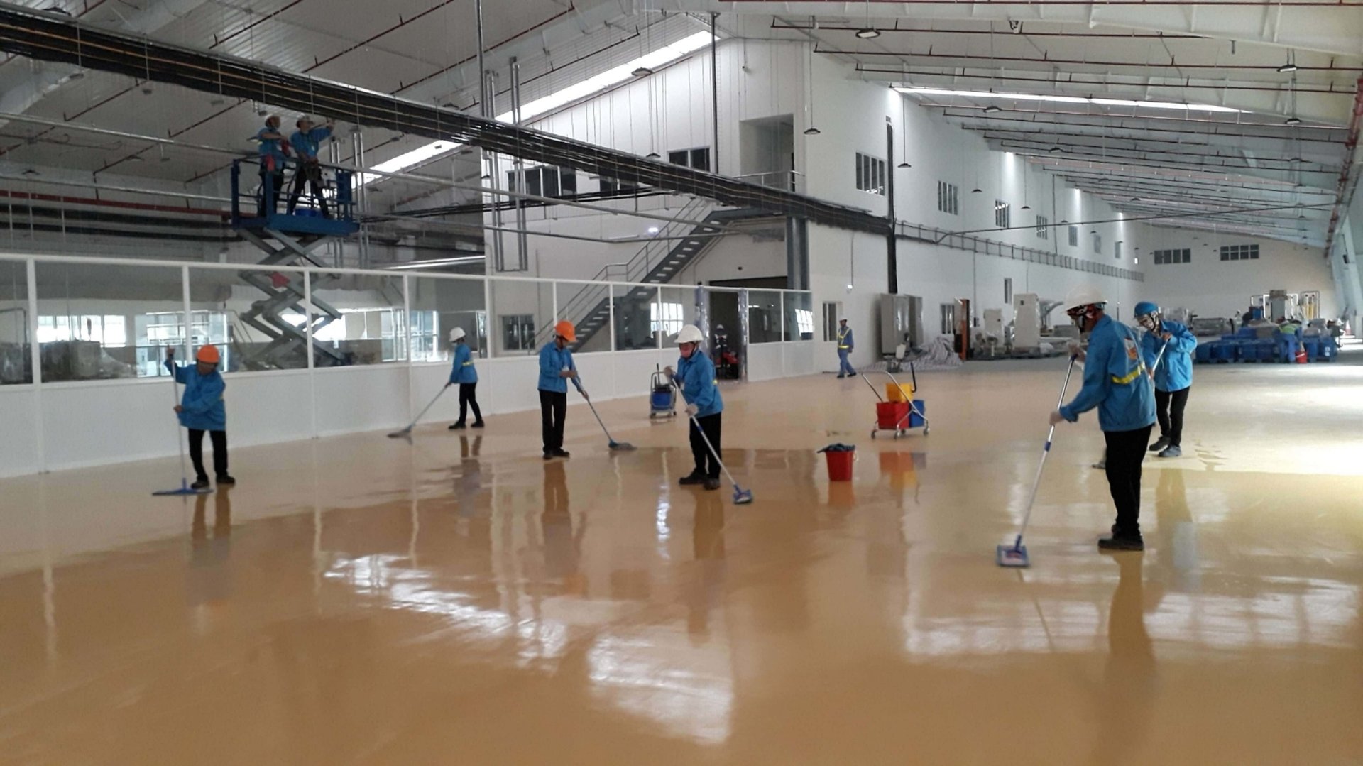 a man working on a piece of wood