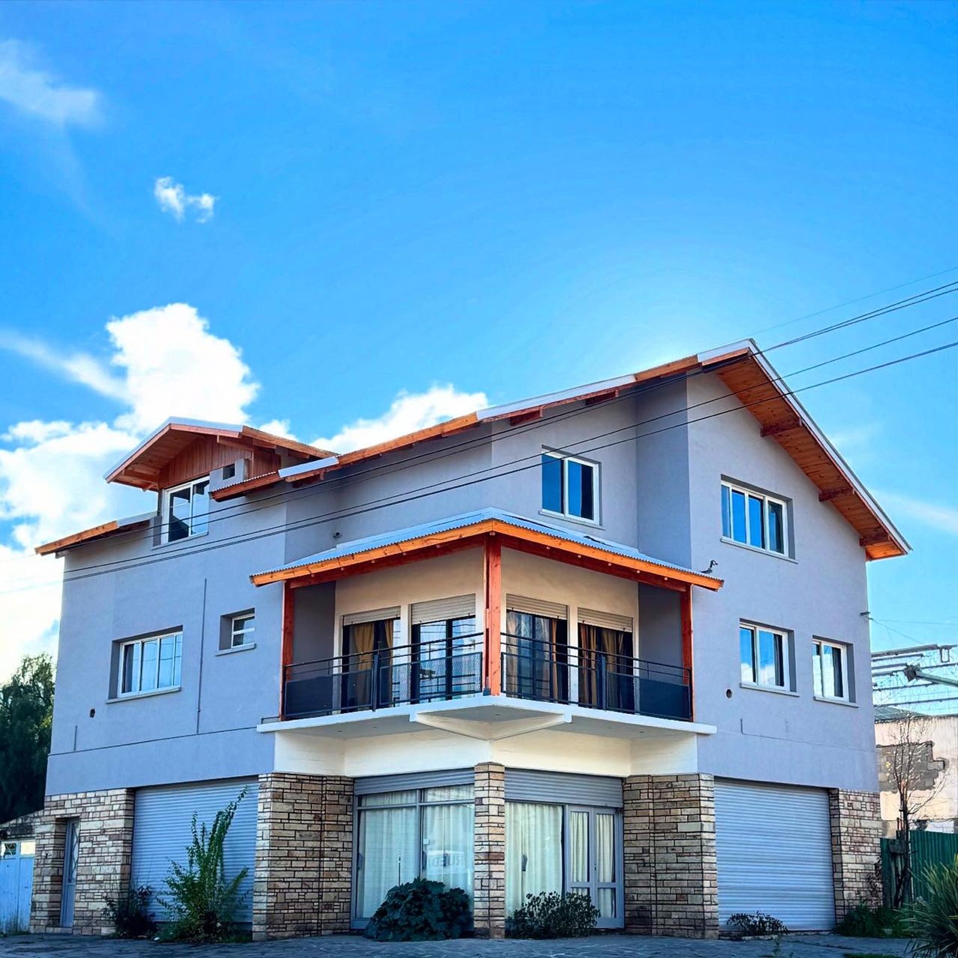 black and brown leather padded tub sofa