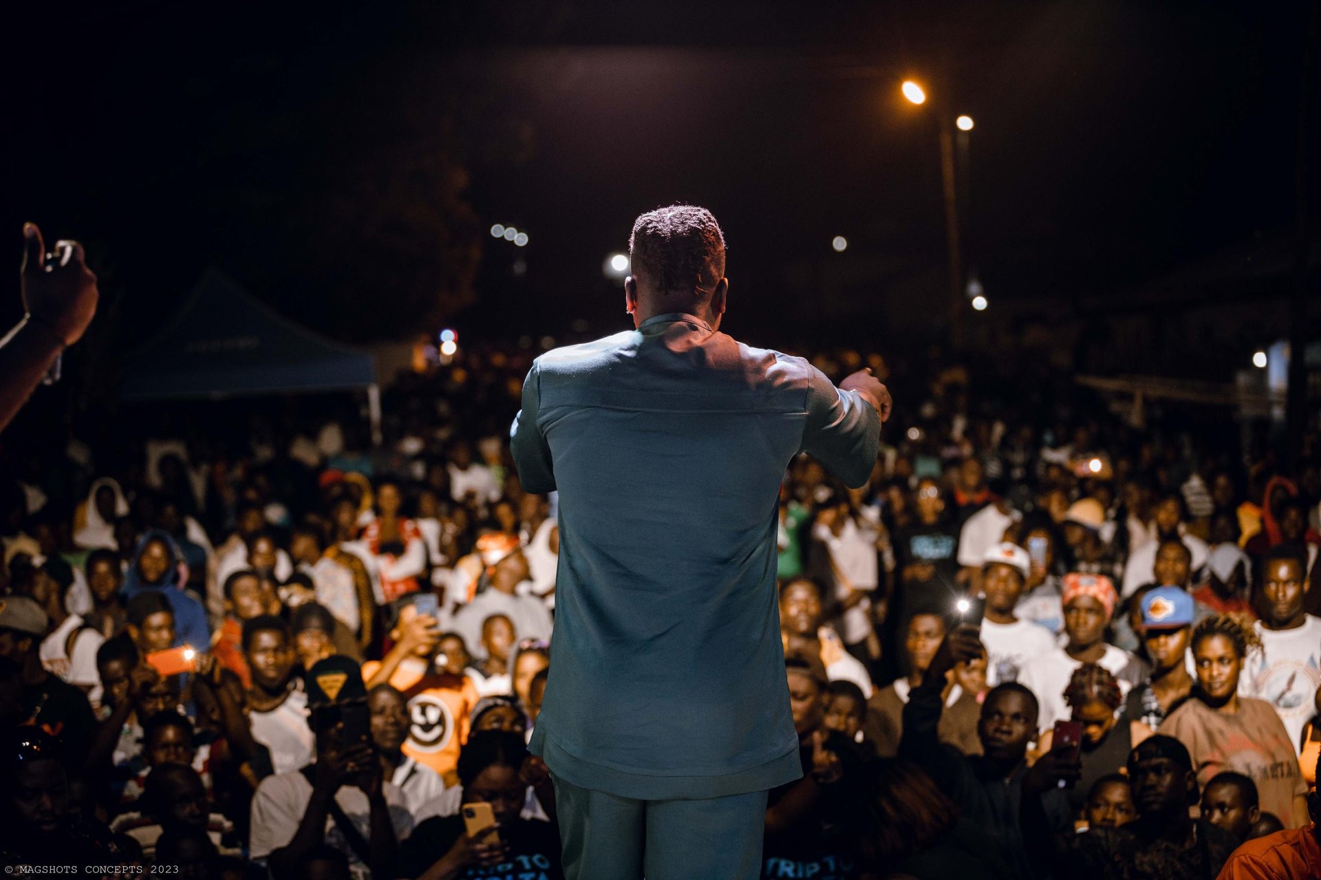 an abstract photo of a curved building with a blue sky in the background