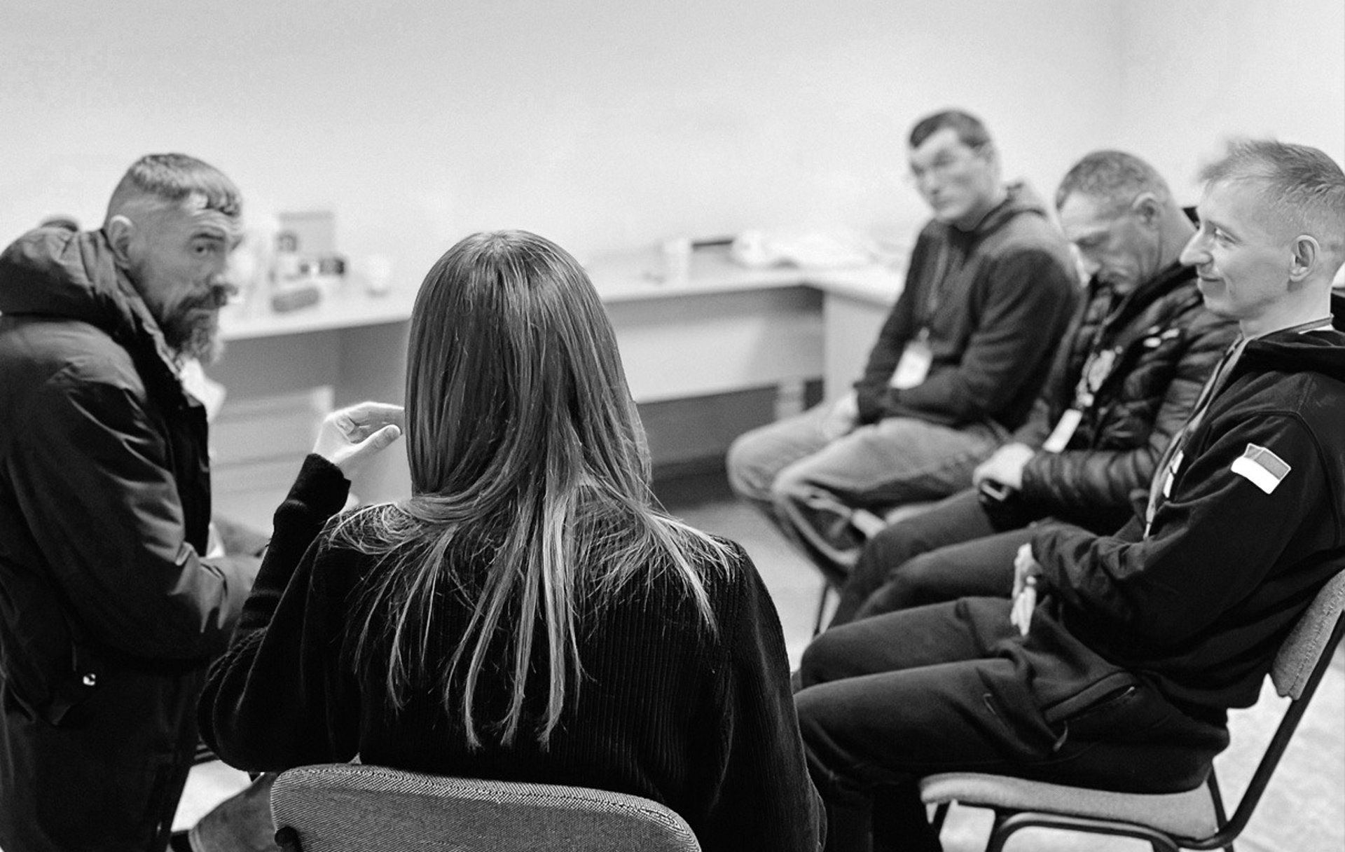 a group of people sitting in a room