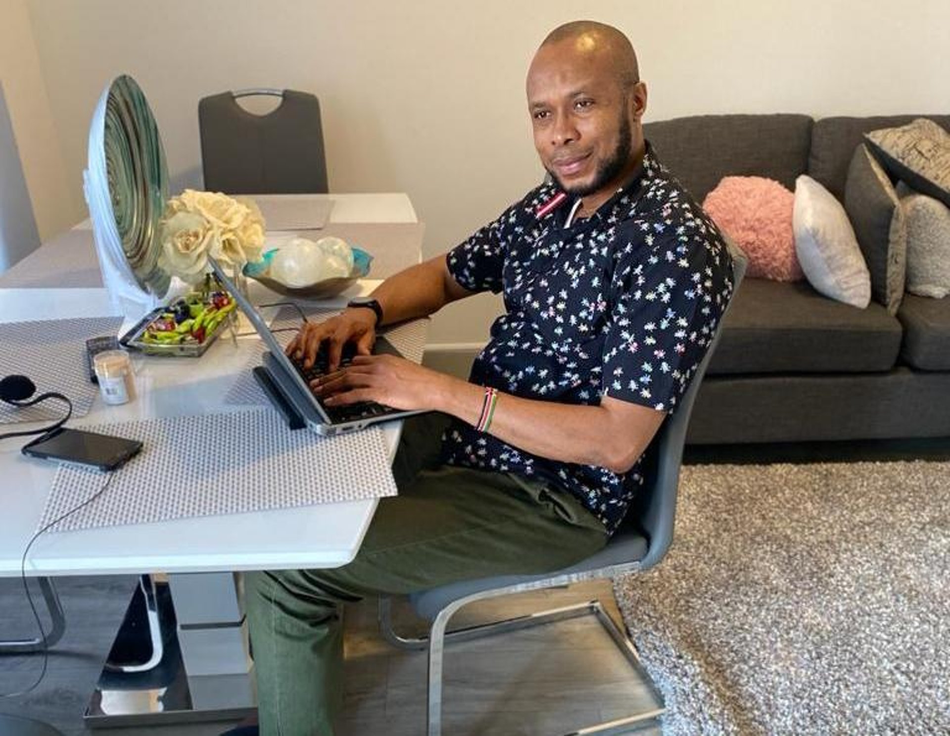 an abstract photo of a curved building with a blue sky in the background