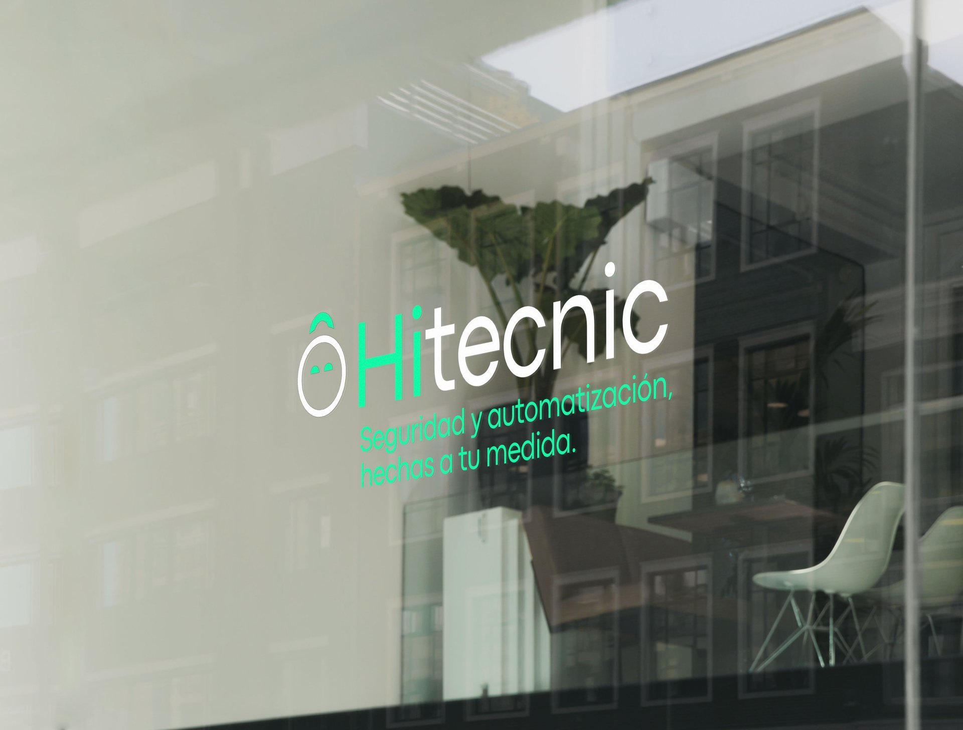an abstract photo of a curved building with a blue sky in the background