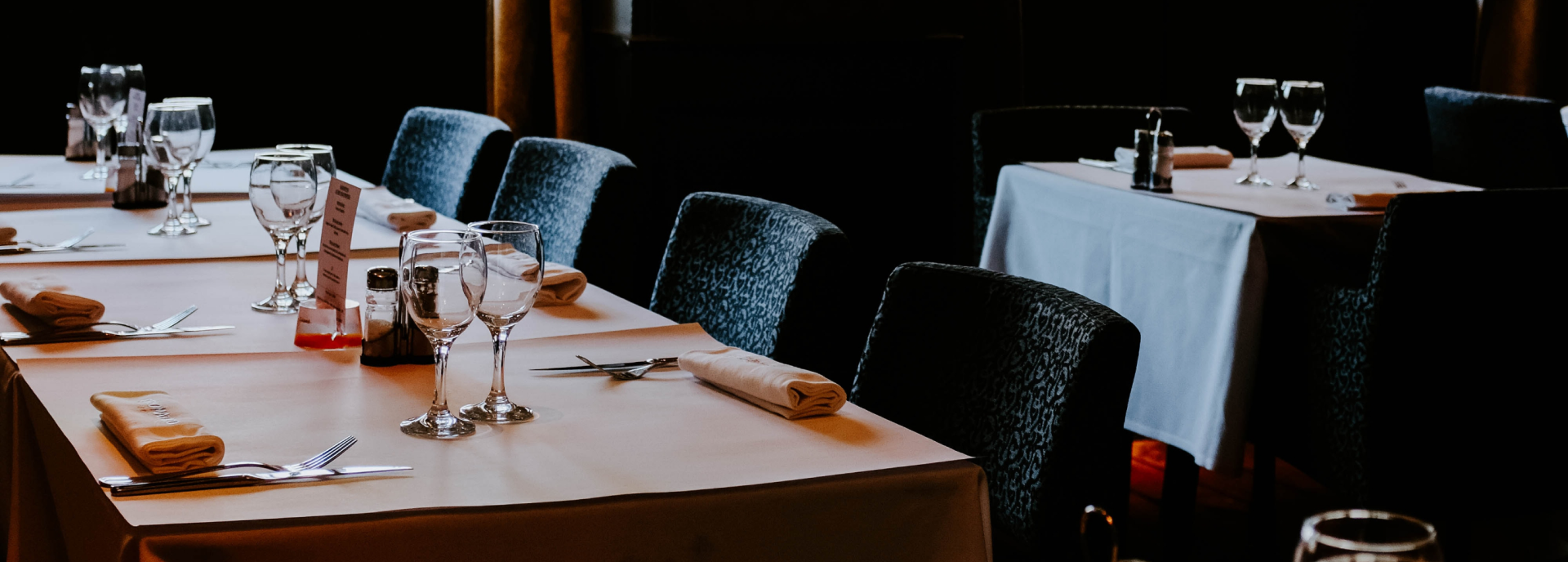 grilled meat with sliced tomato and green vegetable on white ceramic plate