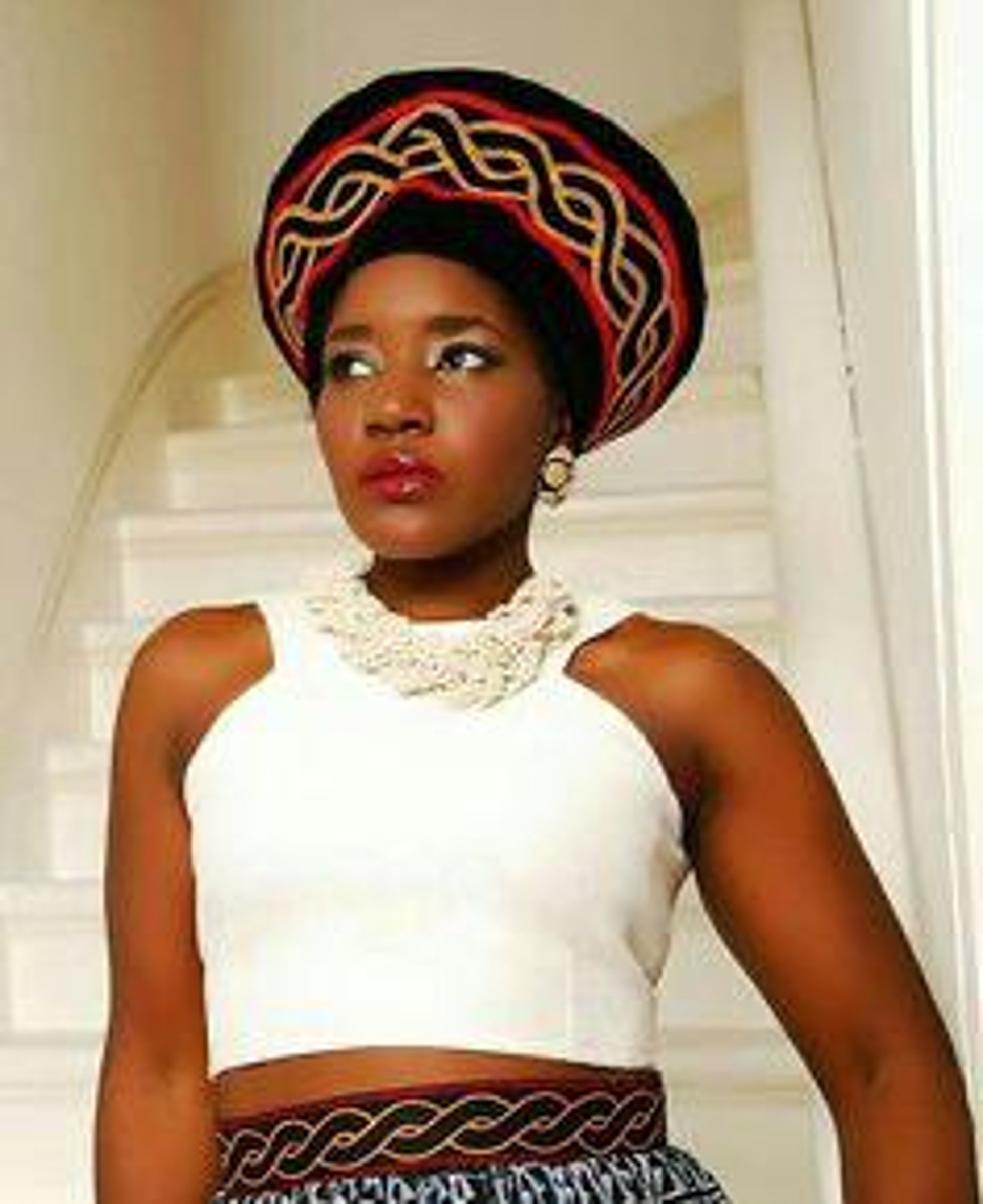 person wearing grey knit sweater