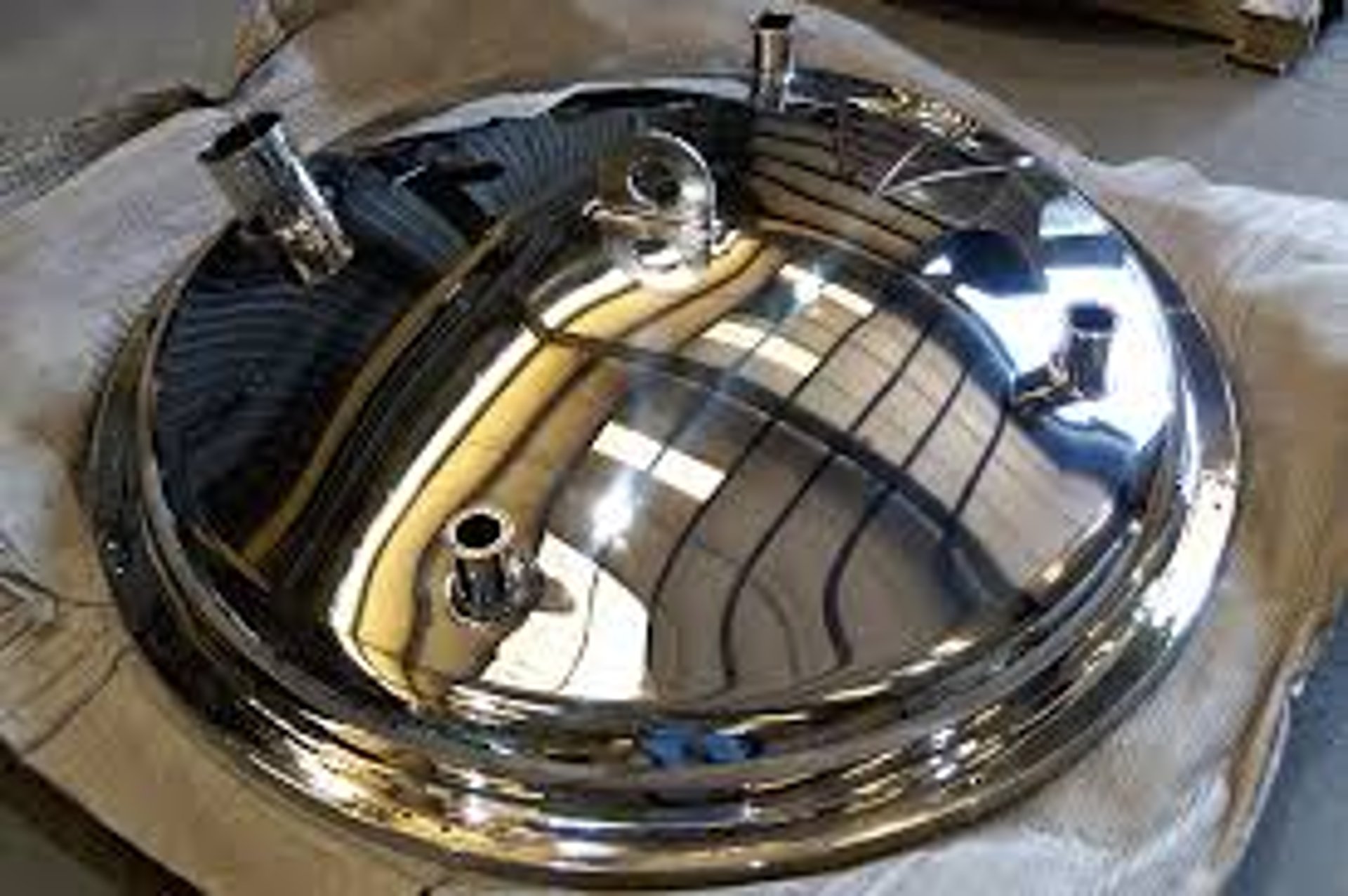 black and brown leather padded tub sofa