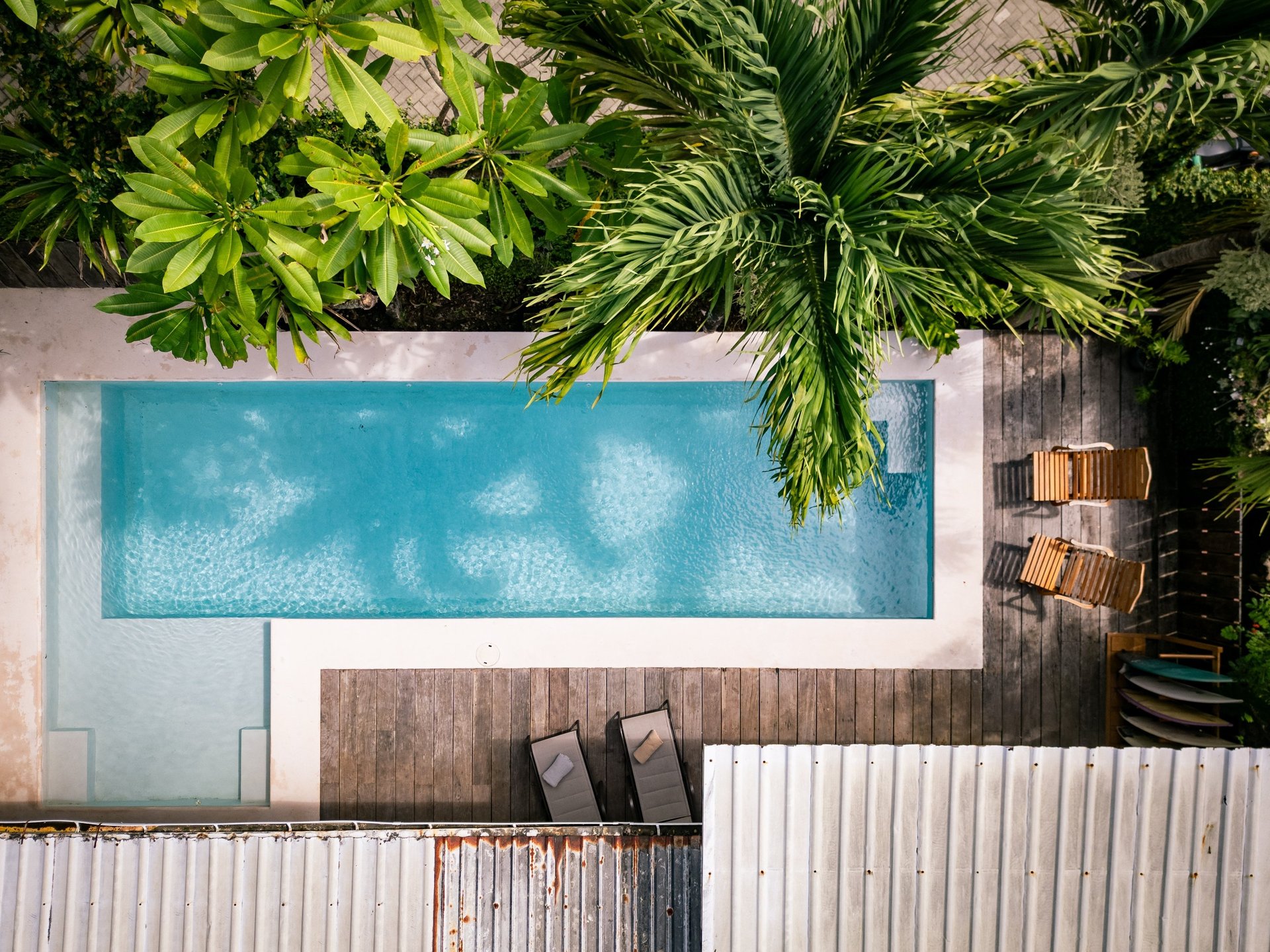 an abstract photo of a curved building with a blue sky in the background