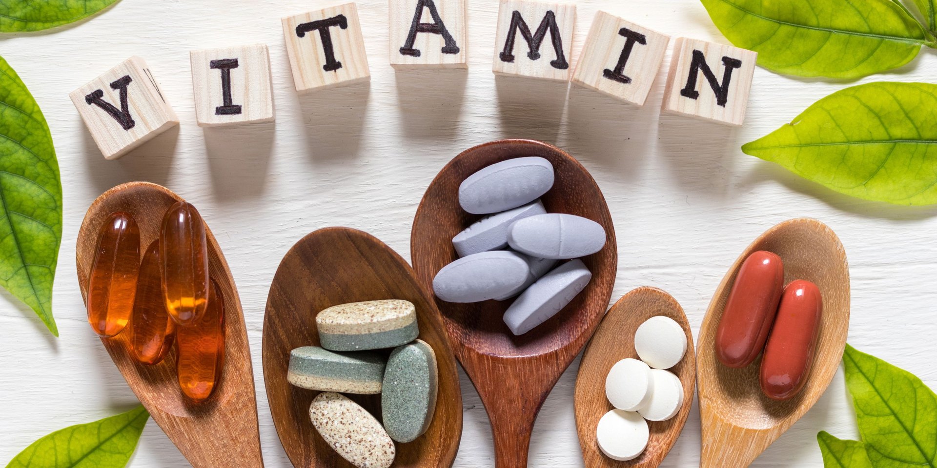 person holding orange labeled bottle