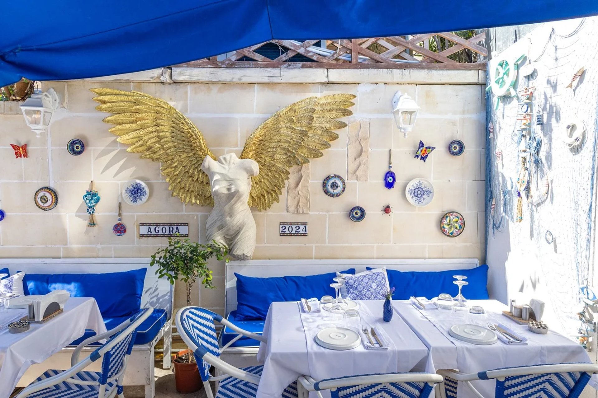 a cutting board with steaks and a knife on it