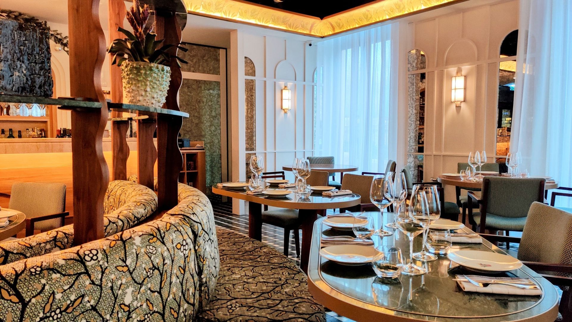 a cutting board with steaks and a knife on it