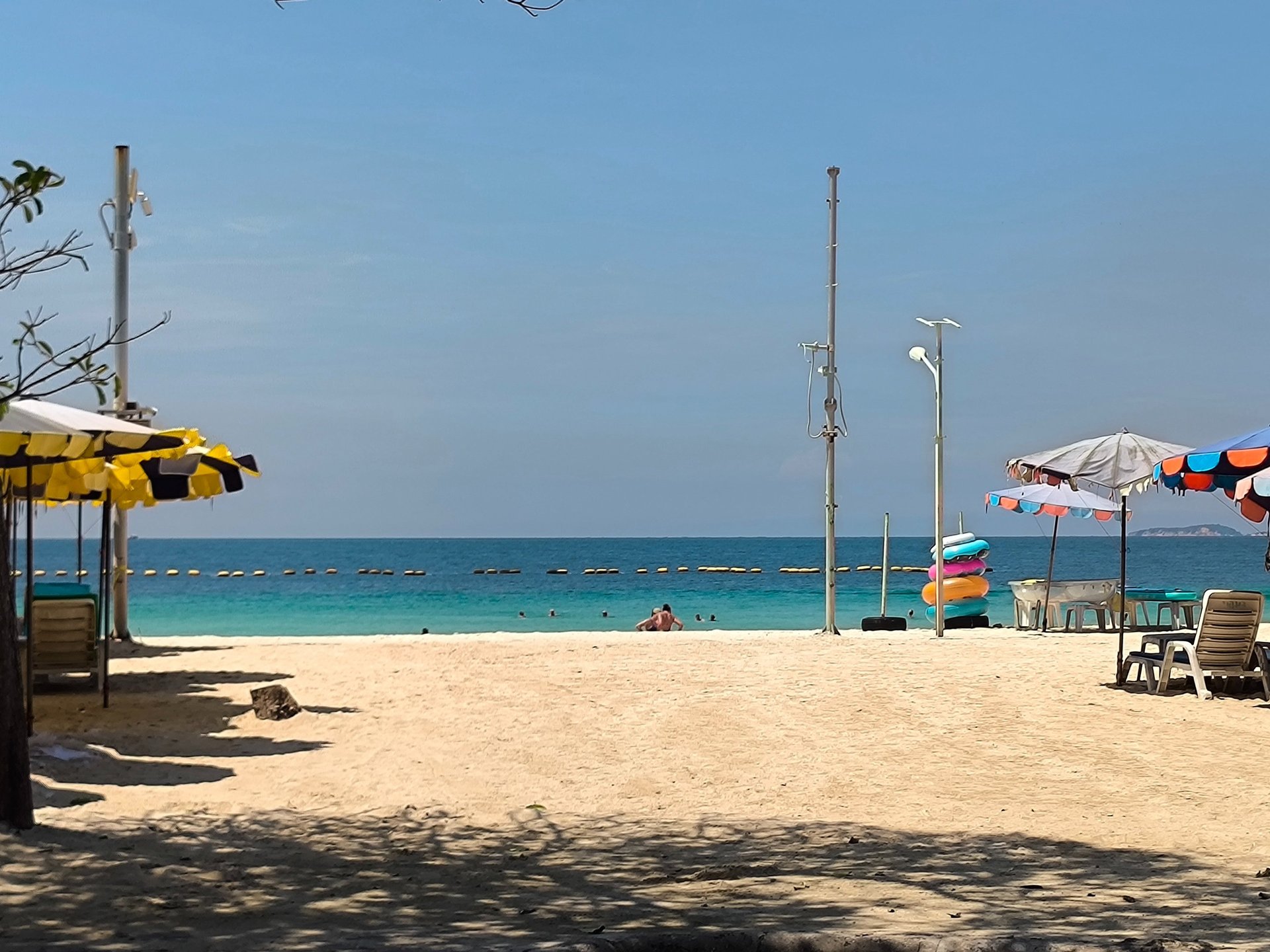 woman sitting on chair near tent