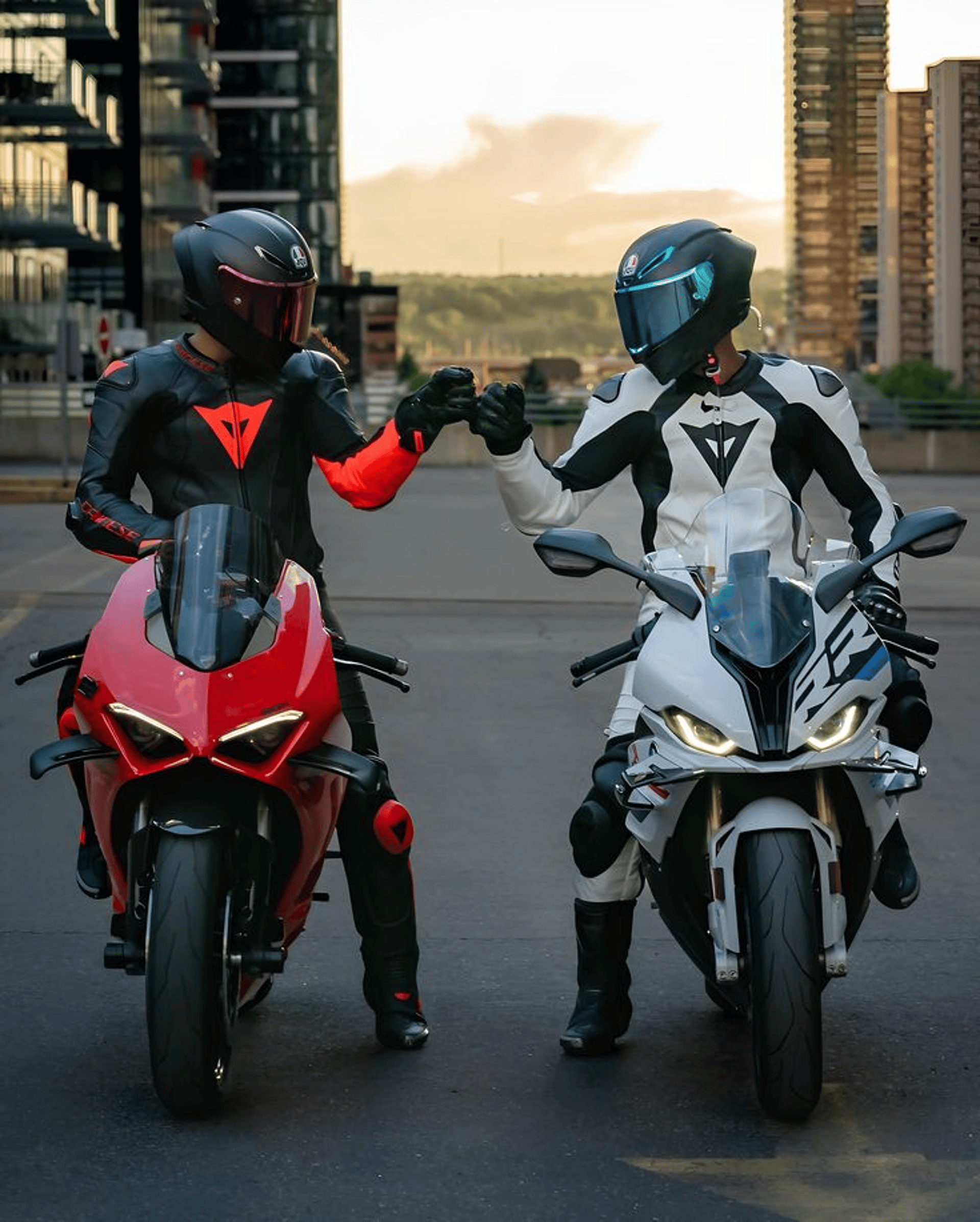 a group of people riding motorcycles down a curvy road
