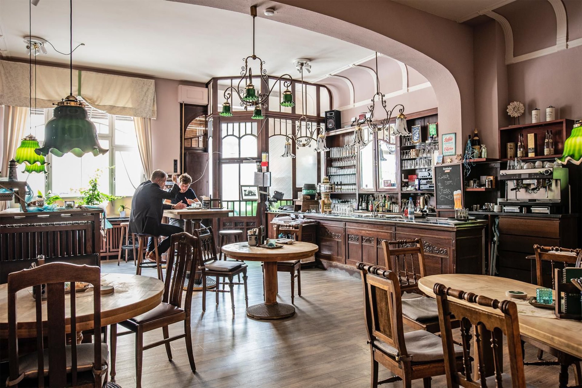 a close up of a black and brown abstract painting