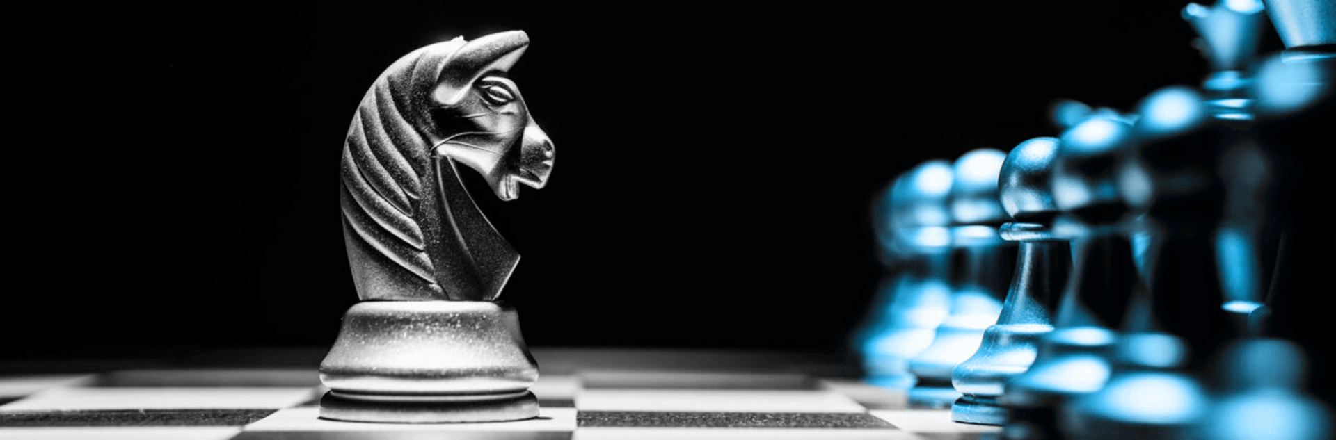 clear glass condiment shakers on black and white checkered table