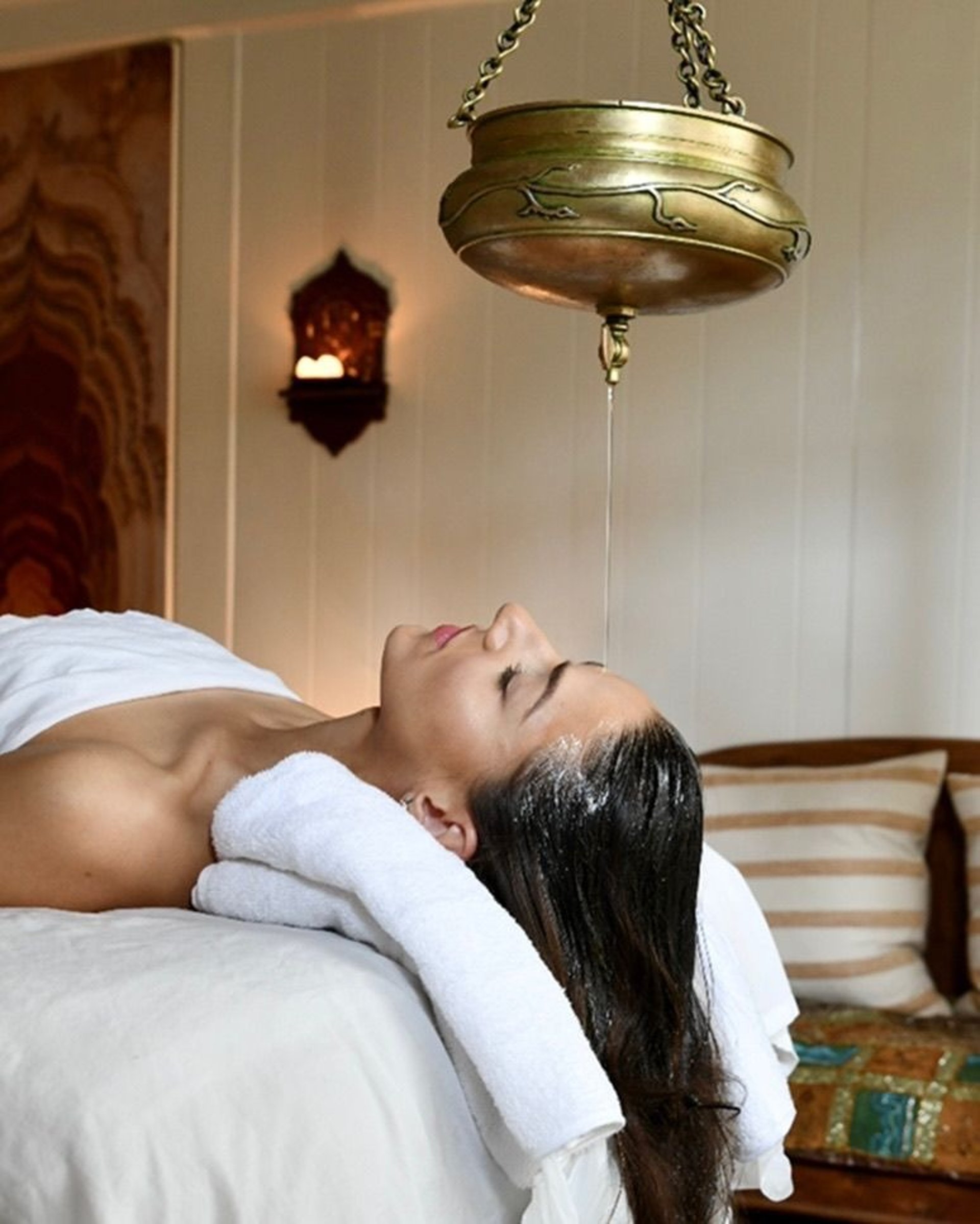an abstract photo of a curved building with a blue sky in the background