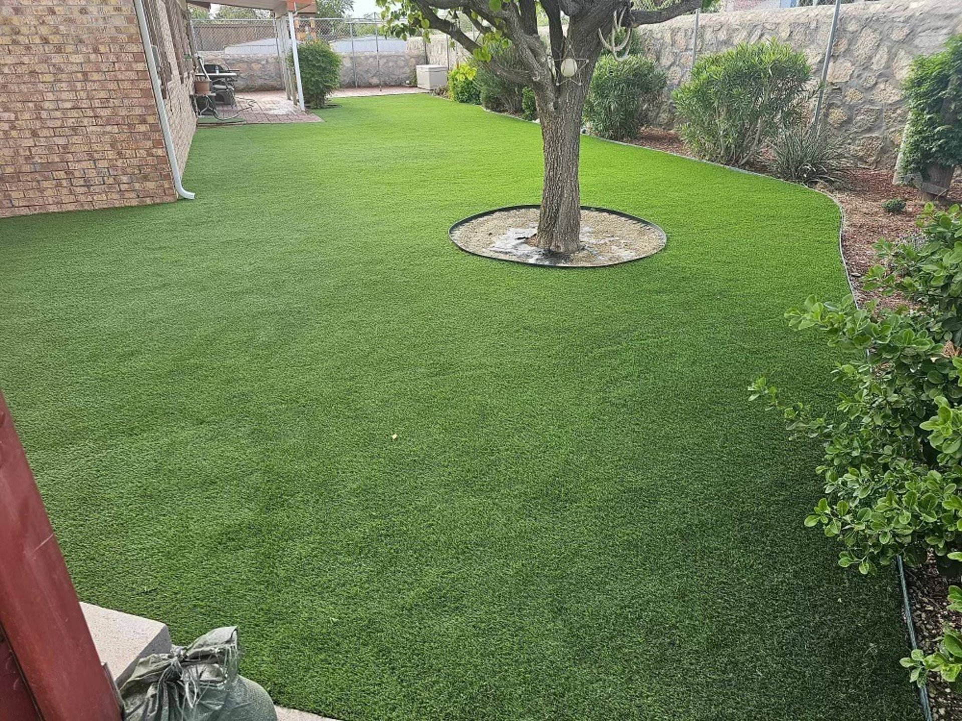 an abstract photo of a curved building with a blue sky in the background