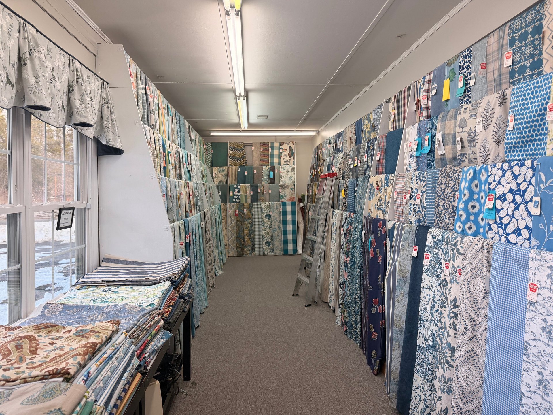 person wearing grey knit sweater