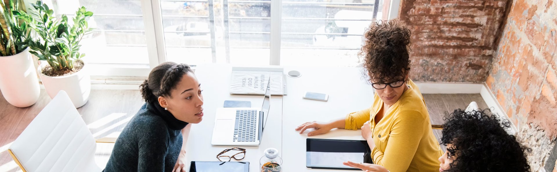 black and brown leather padded tub sofa