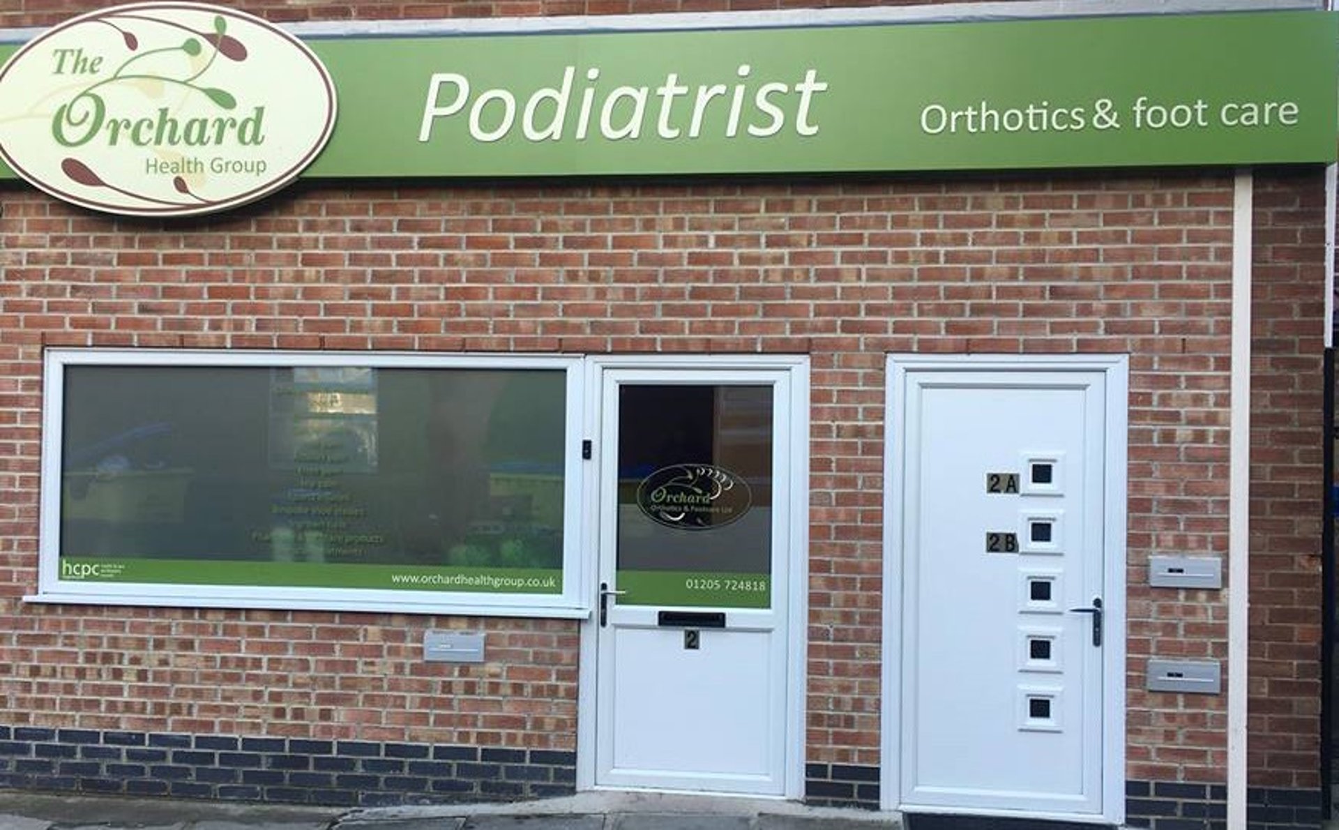 woman wearing yellow long-sleeved dress under white clouds and blue sky during daytime