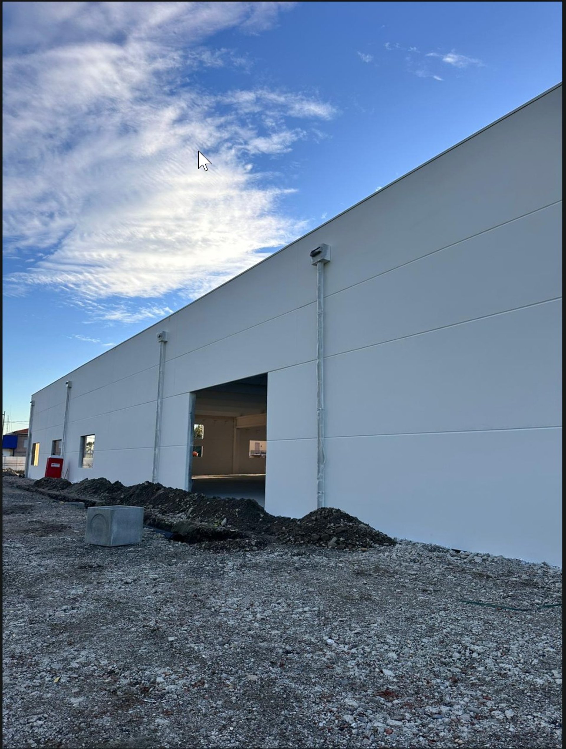 woman wearing yellow long-sleeved dress under white clouds and blue sky during daytime