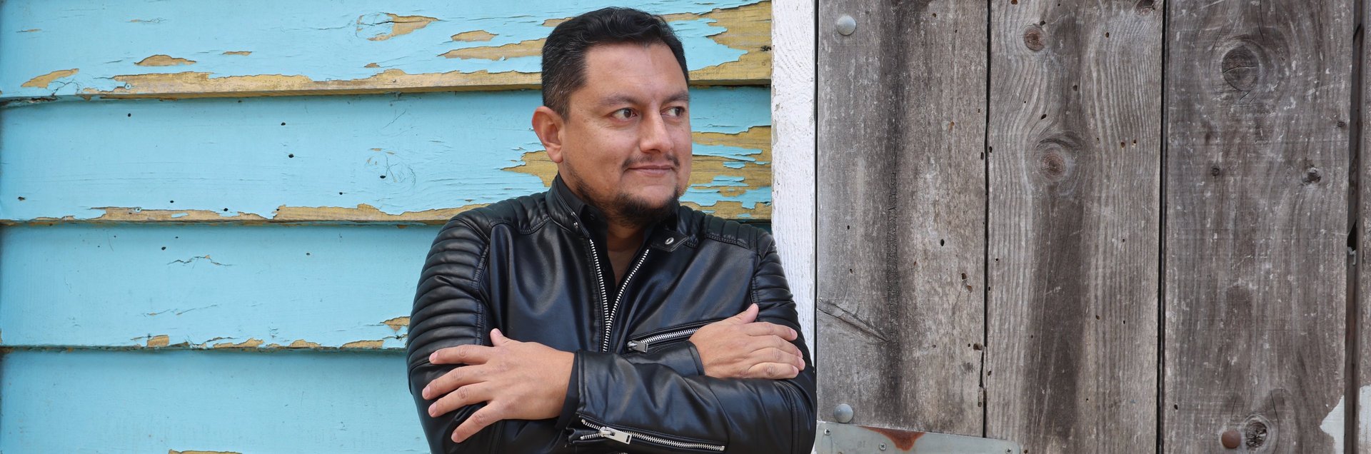 black and brown leather padded tub sofa