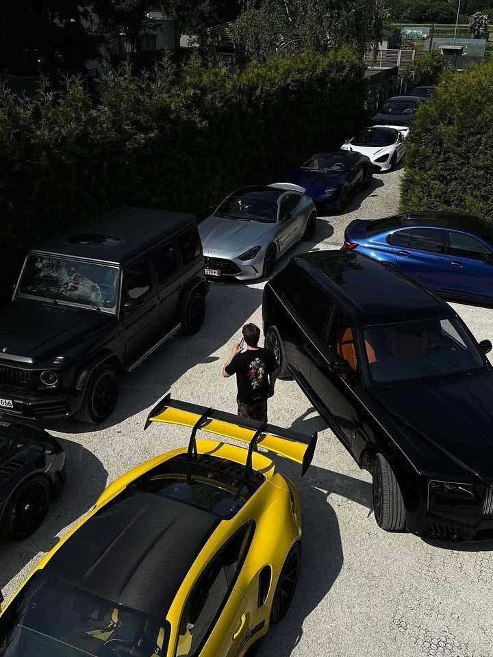 woman wearing yellow long-sleeved dress under white clouds and blue sky during daytime