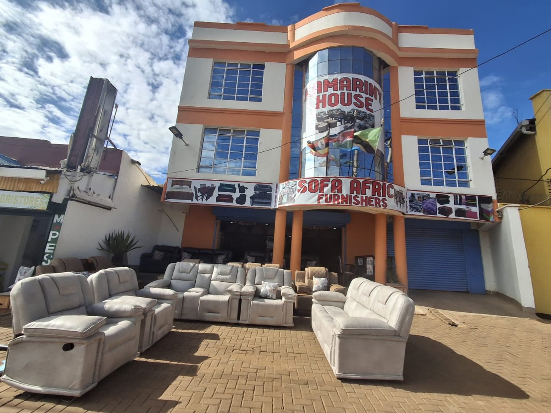 woman wearing yellow long-sleeved dress under white clouds and blue sky during daytime