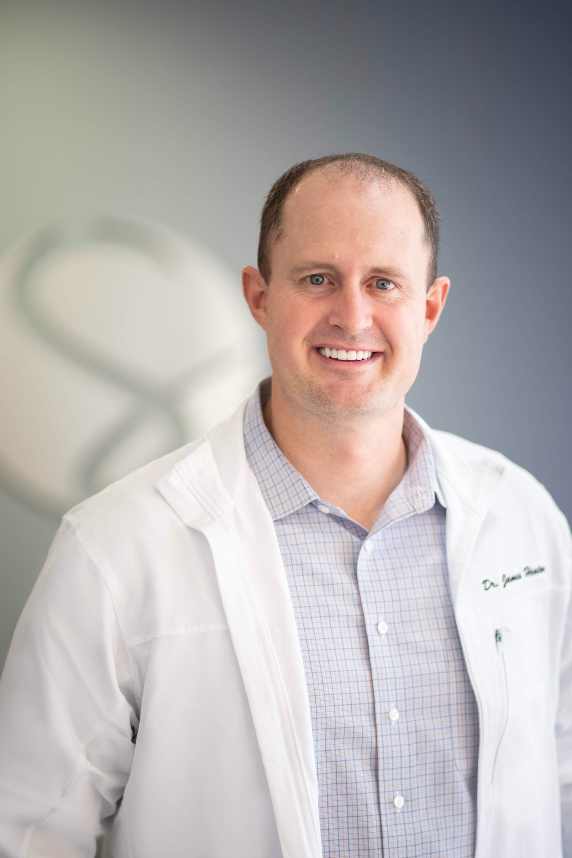 Professional headshot of a healthcare provider for business branding.