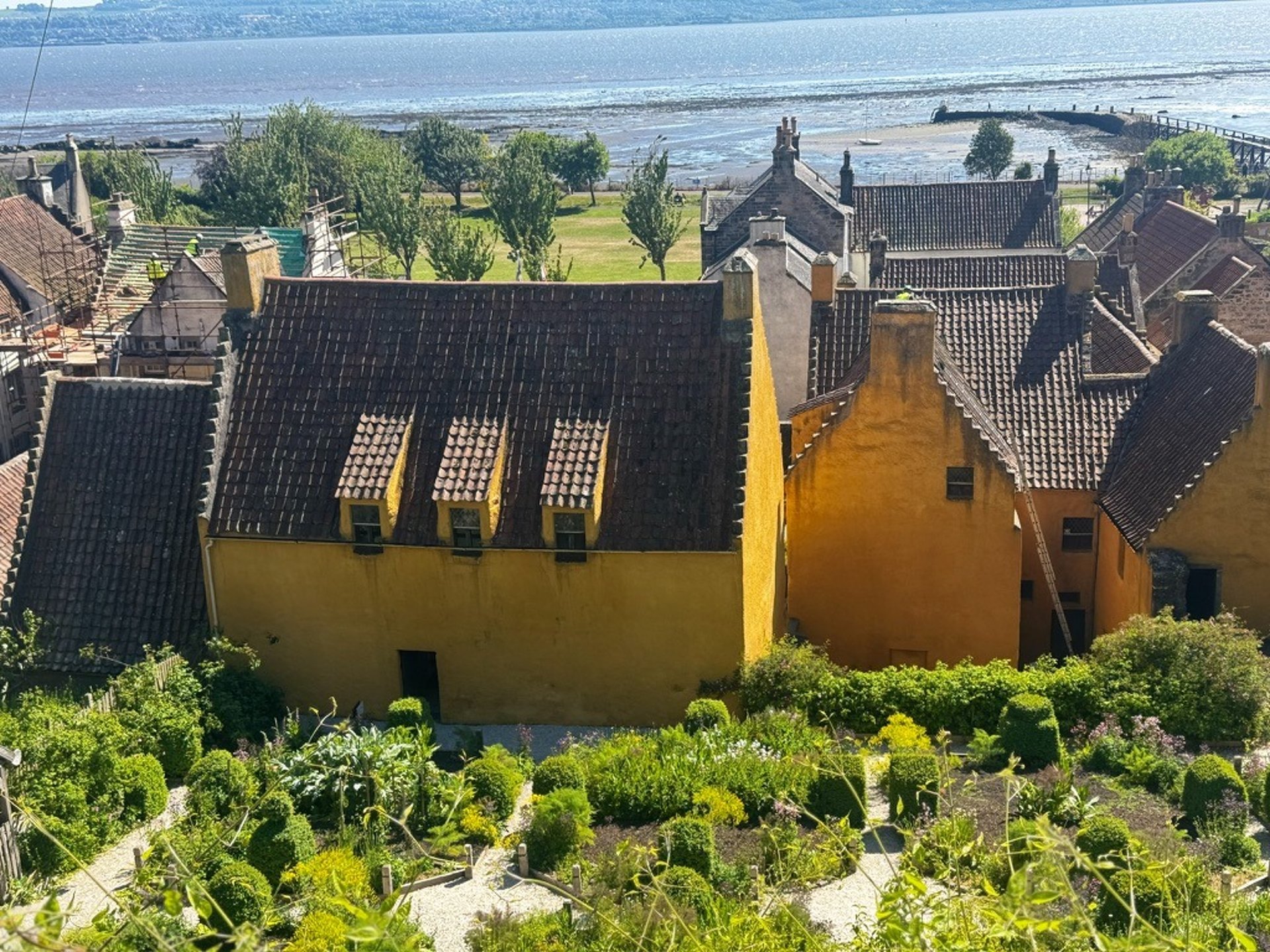 Gardens at rear of Culross Palace with the Firth of Forth in the distance