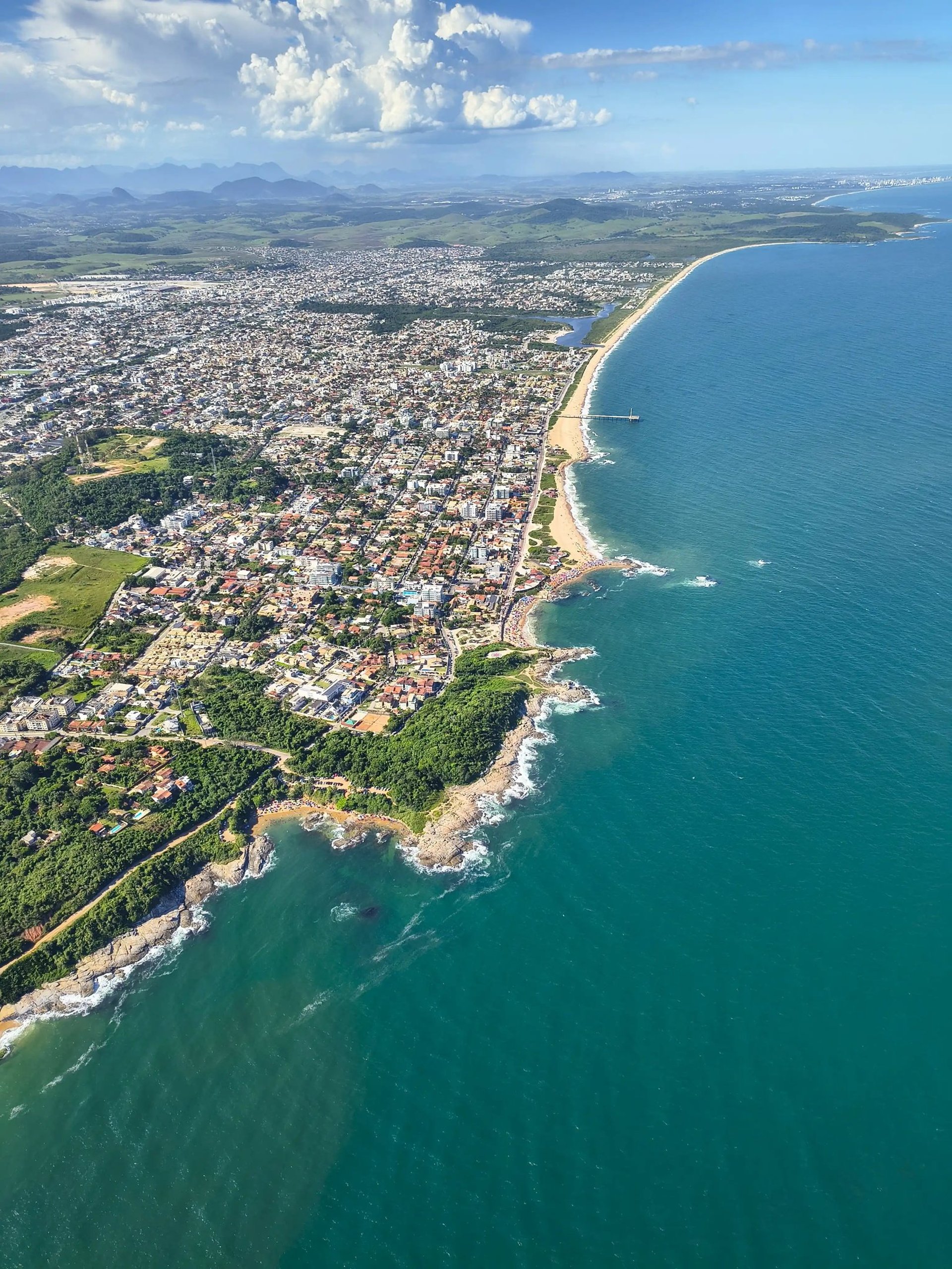 woman wearing yellow long-sleeved dress under white clouds and blue sky during daytime