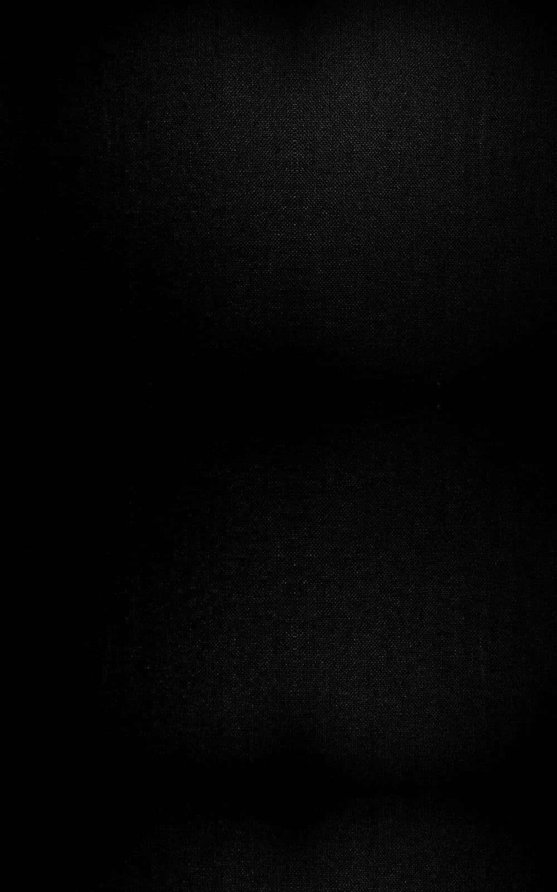 a black and white photo of a black surface