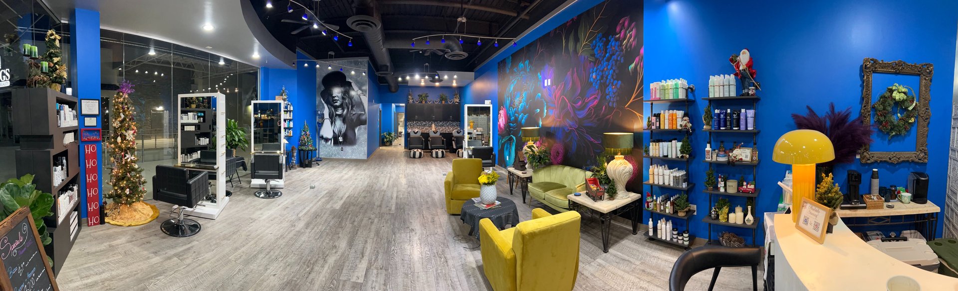 woman in red long sleeve shirt holding hair blower